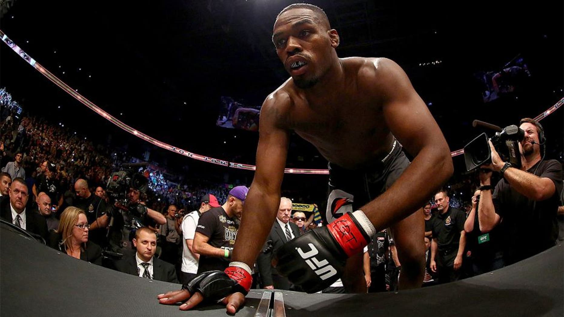 TORONTO, CANADA - SEPTEMBER 21: Jon 'Bones' Jones enters the Octagon prior to his fight against Alexander Gustafsson (not pictured) in their UFC light heavyweight championship bout at the Air Canada Center on September 21, 2013 in Toronto, Ontario, Canada. (Photo by Al Bello/Zuffa LLC/Zuffa LLC via Getty Images) *** Local Caption *** Jon Jones