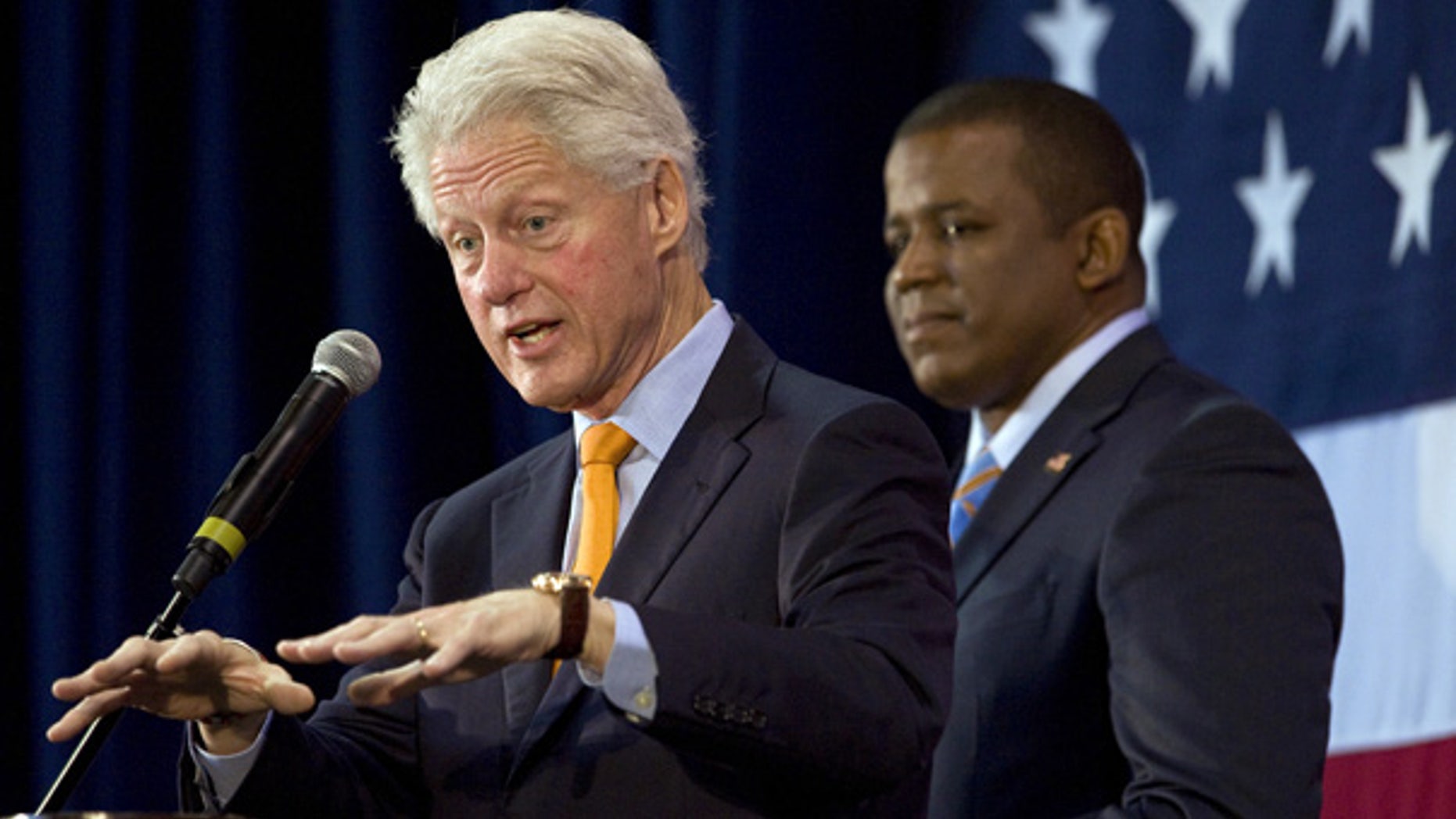 Oct. 19: Florida Democratic Senate candidate Kendrick Meek, right, listens to Former President Bill Clinton address supporters during a campaign rally in St. Petersburg.