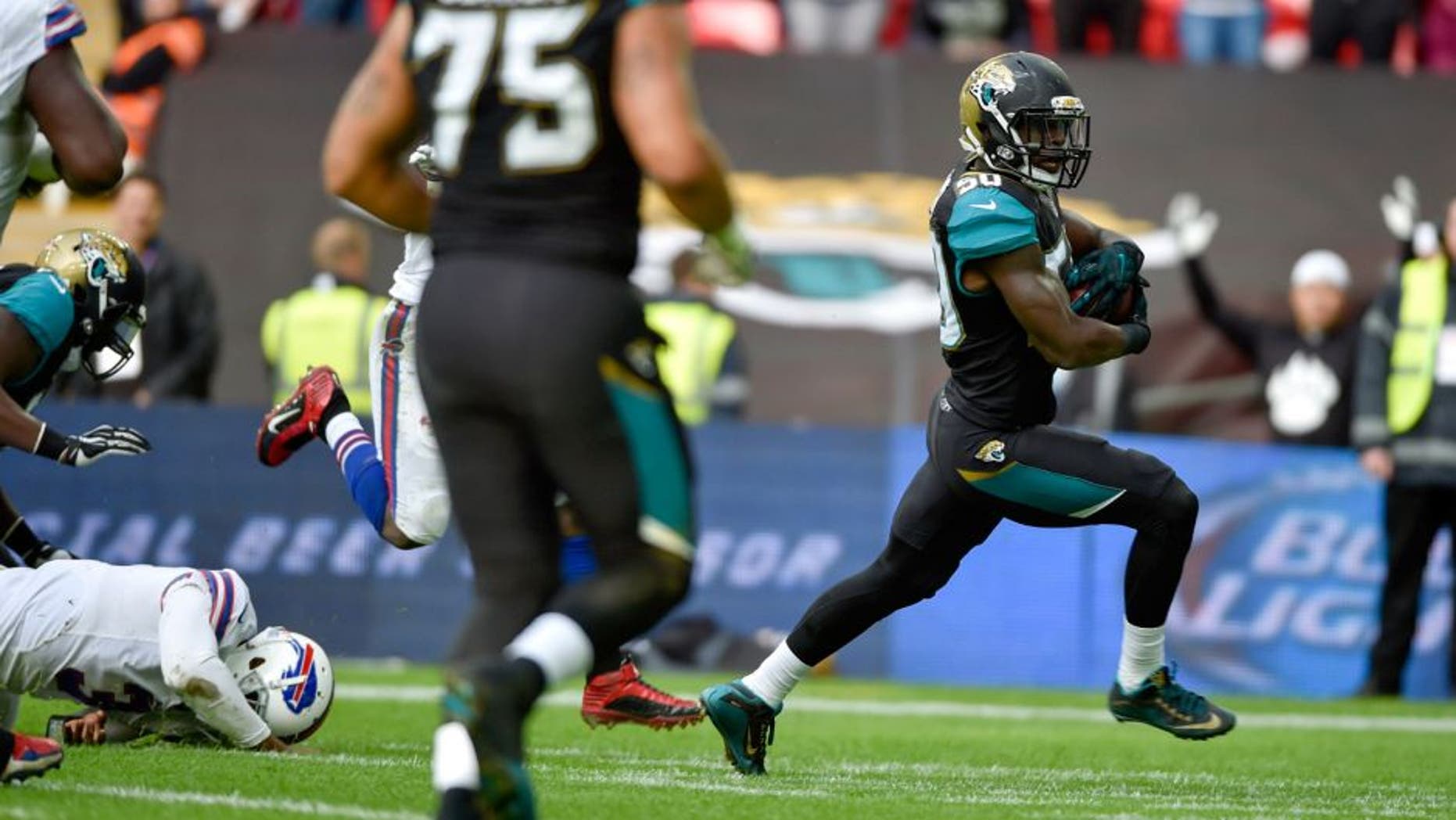 Oct 25, 2015; London, United Kingdom; Jacksonville Jaguars outside linebacker Telvin Smith (50) scores a touchdown during the first half of the game against the Buffalo Bills at Wembley Stadium. Mandatory Credit: Steve Flynn-USA TODAY Sports