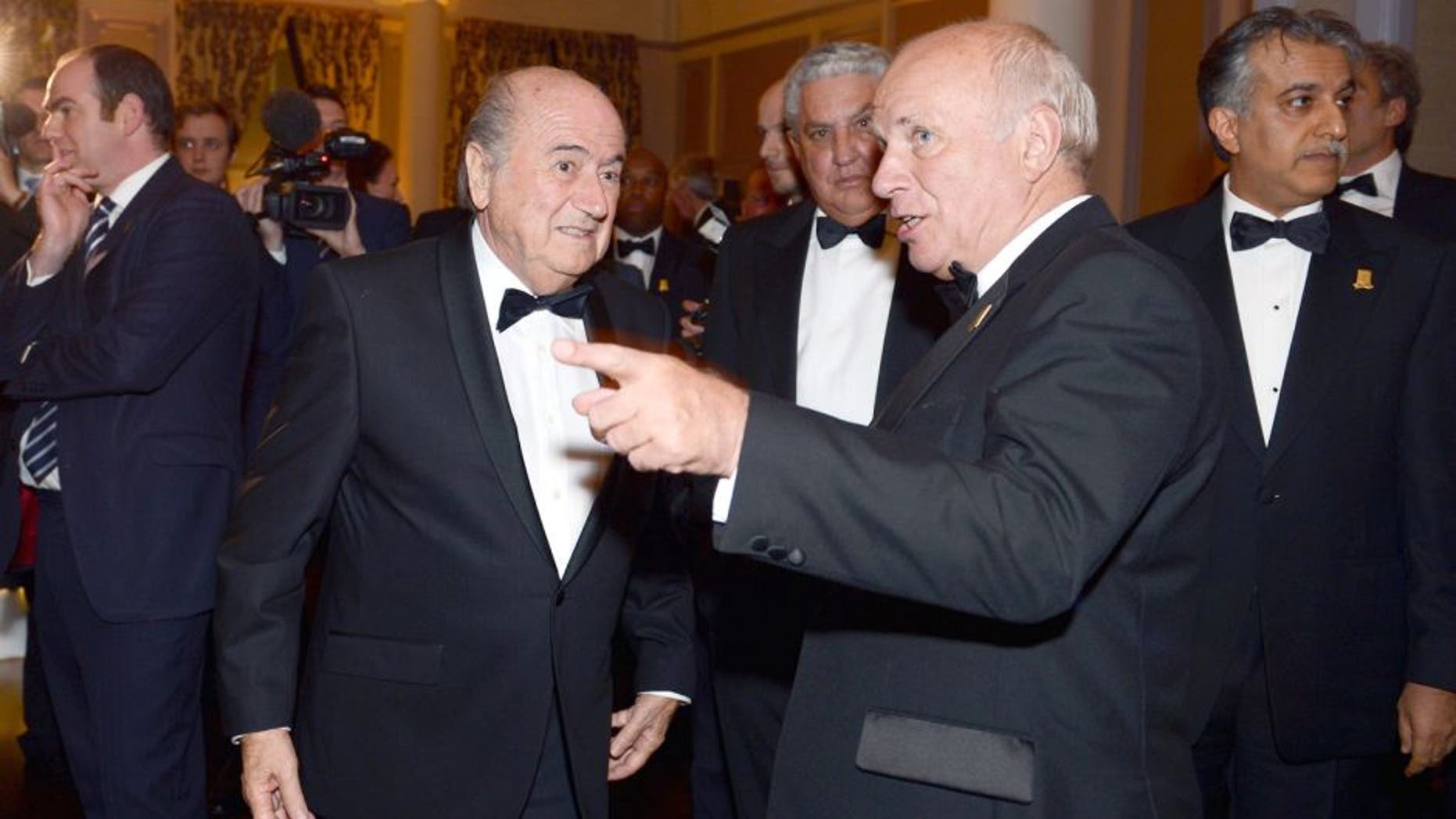LONDON, ENGLAND - OCTOBER 26: Greg Dyke, FA Chairman talks to Joseph Blatter, FIFA President during the FA150 Gala Dinner commemorating the Football Association's 150th year at the Grand Connaught Rooms on October 26, 2013 in London, England. (Photo by Michael Regan/The FA via Getty Images)