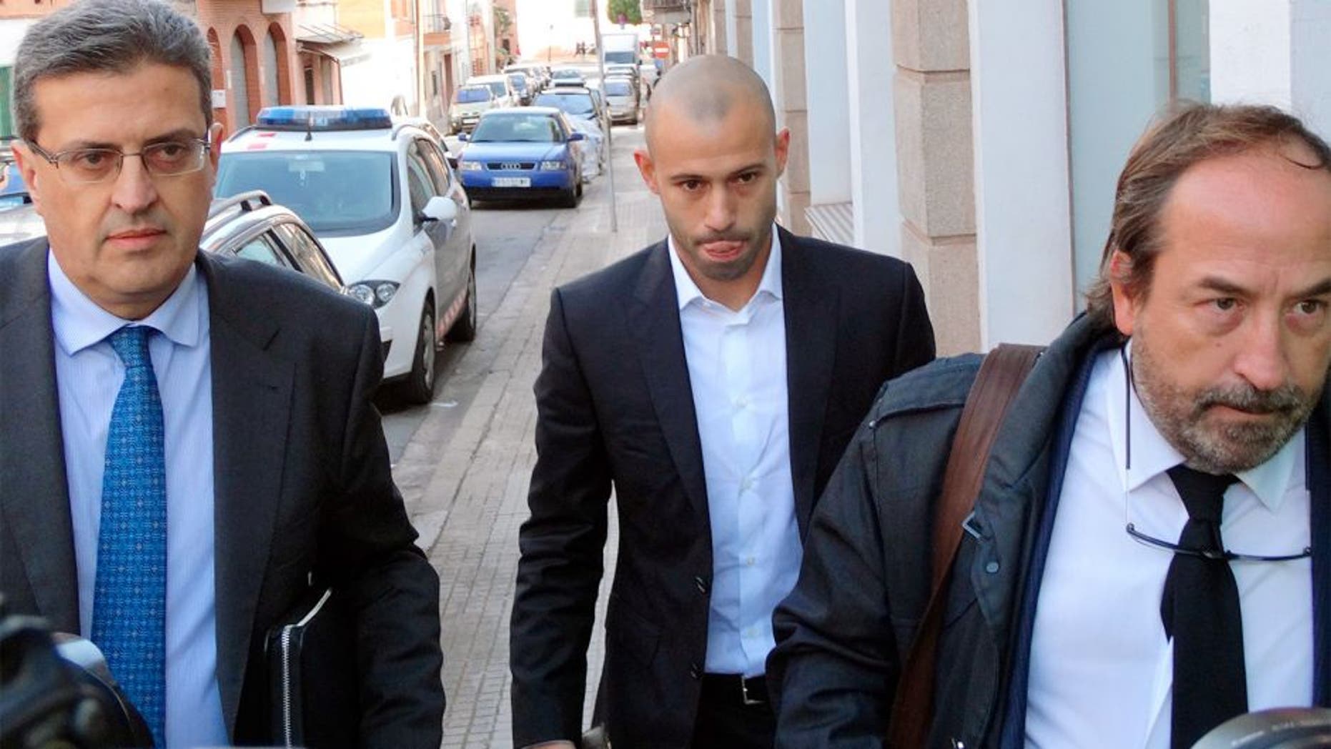 BARCELONA, SPAIN - OCTOBER 29: Barcelona football player Javier Mascherano (C) attends court charged of defrauding more than 1,5 million euros on October 29, 2015 in Barcelona, Spain. (Photo by Europa Press/Europa Press via Getty Images)
