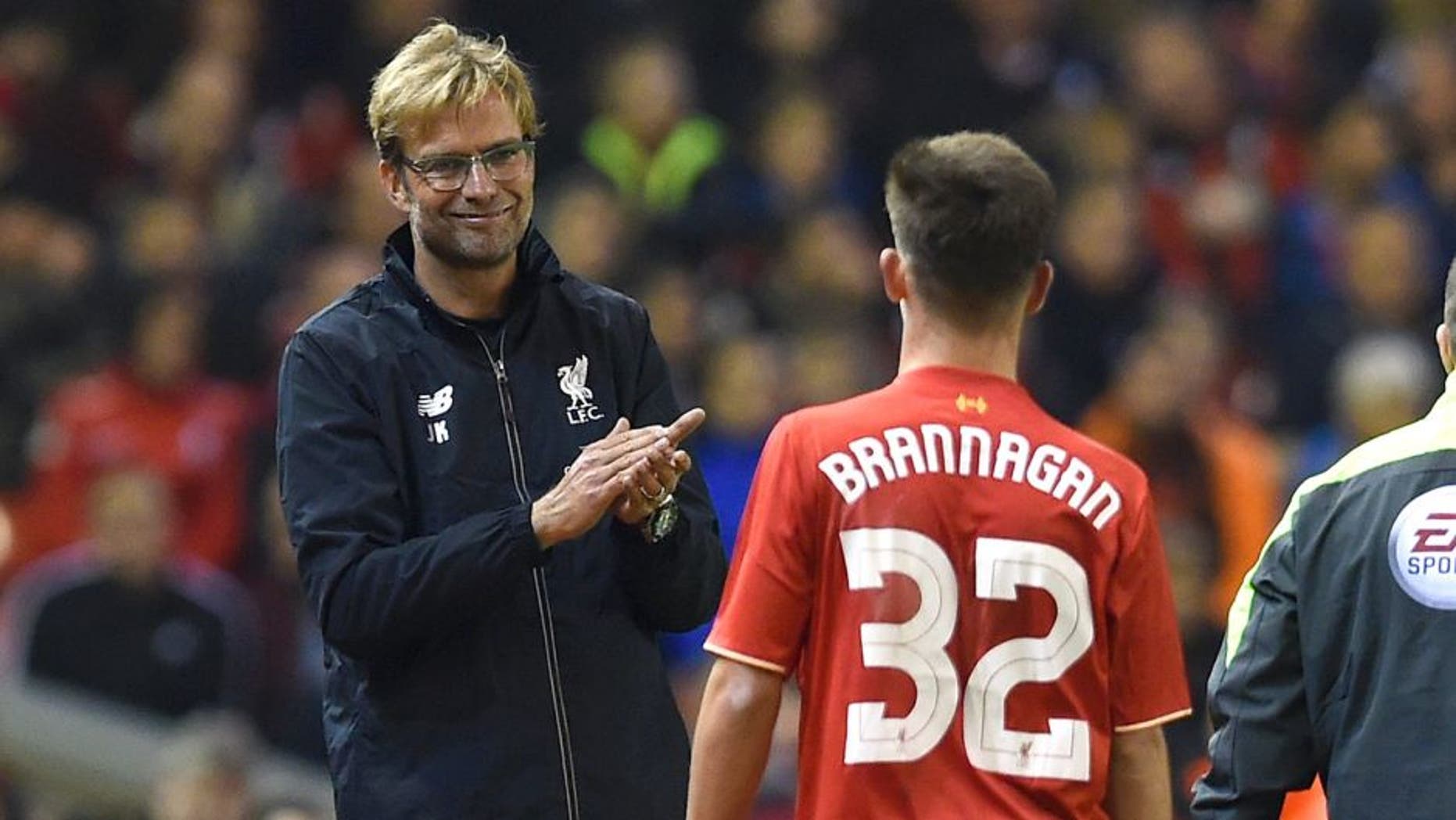 LIVERPOOL, ENGLAND - OCTOBER 28: (THE SUN OUT, THE SUN ON SUNDAY OUT) Jurgen Klopp manager of Liverpool gives a hug and a clap to Cameron Brannagan of Liverpool during the Capital One Cup Fourth Round match between Liverpool and AFC Bournemouth at Anfield on October 28, 2015 in Liverpool, England. (Photo by John Powell/Liverpool FC via Getty Images)