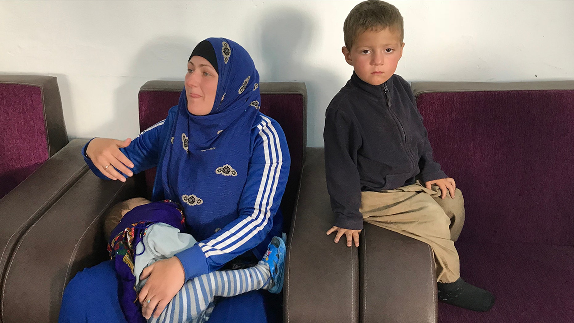 Lena Frizler talks of returning to her native Germany, but fears her children will be taken from her.