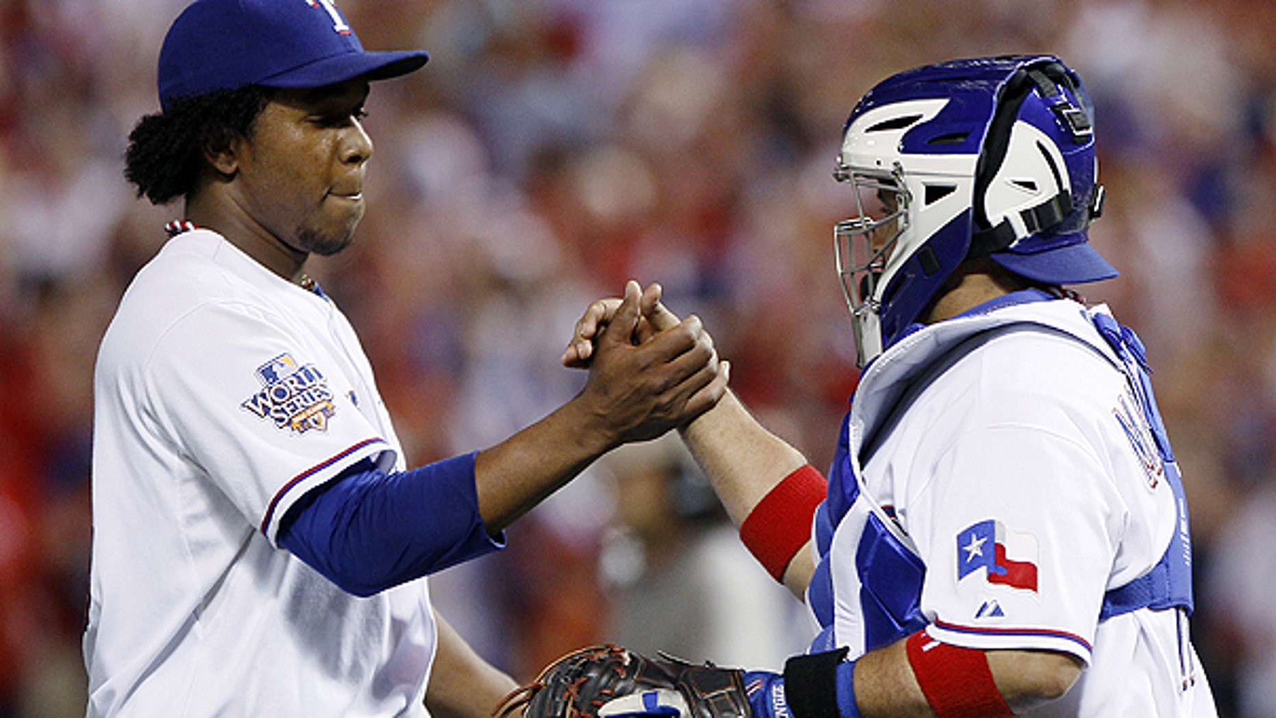 Oct. 30: Texas Rangers' Neftali Feliz is congratulated by catcher Bengie Molina after Game 3 of baseball's World Series against the San Francisco Giants.