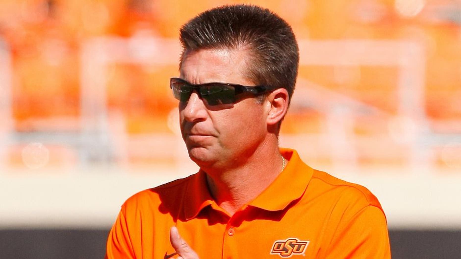 Oct 25, 2014; Stillwater, OK, USA; Oklahoma State Cowboys head coach Mike Gundy before the start of a game against West Virginia Mountaineers at Boone Pickens Stadium. Mandatory Credit: Alonzo Adams-USA TODAY Sports