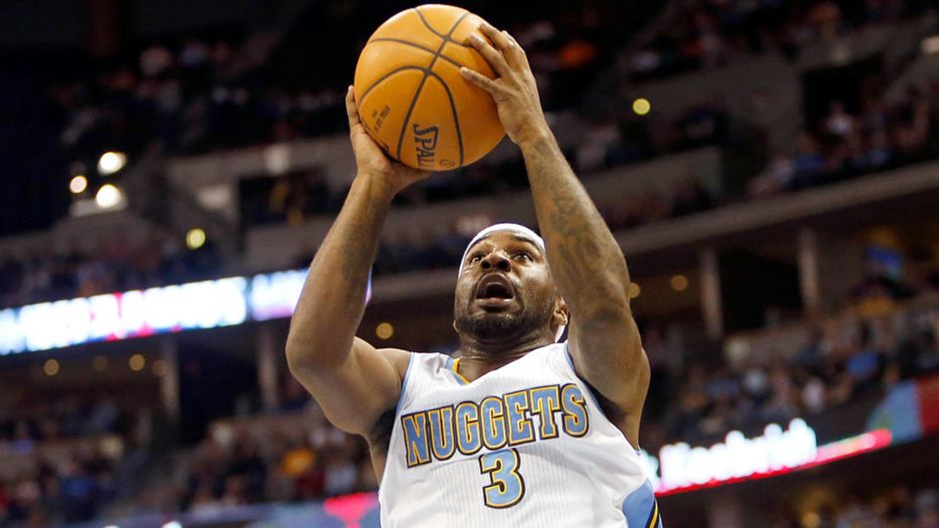 Oct 29, 2014; Denver, CO, USA; Denver Nuggets guard Ty Lawson (3) shoots the ball during the first half against the Detroit Pistons at Pepsi Center. Mandatory Credit: Chris Humphreys-USA TODAY Sports
