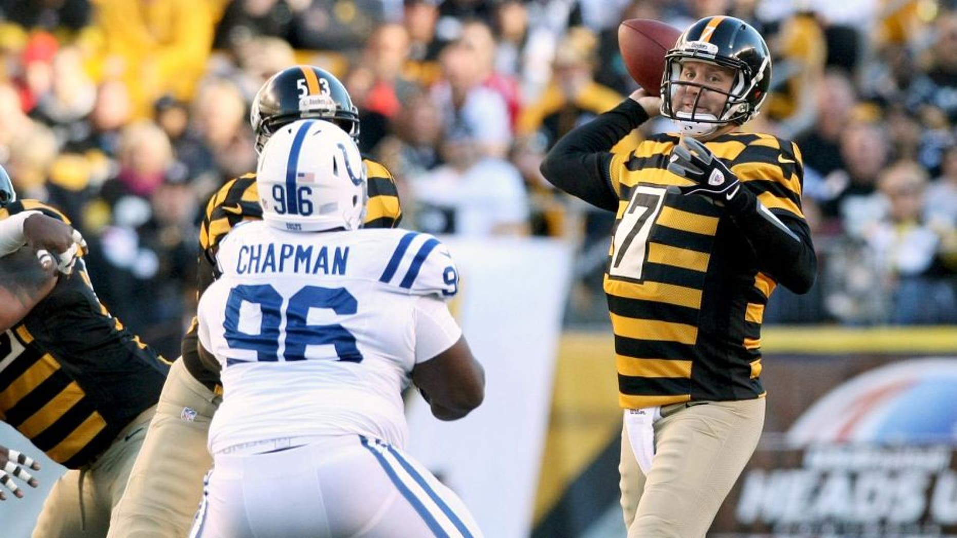 Oct 26, 2014; Pittsburgh, PA, USA; Pittsburgh Steelers quarterback Ben Roethlisberger (7) throws a pass under pressure from Indianapolis Colts nose tackle Josh Chapman (96) during the first quarter of their game at Heinz Field. Mandatory Credit: Jason Bridge-USA TODAY Sports