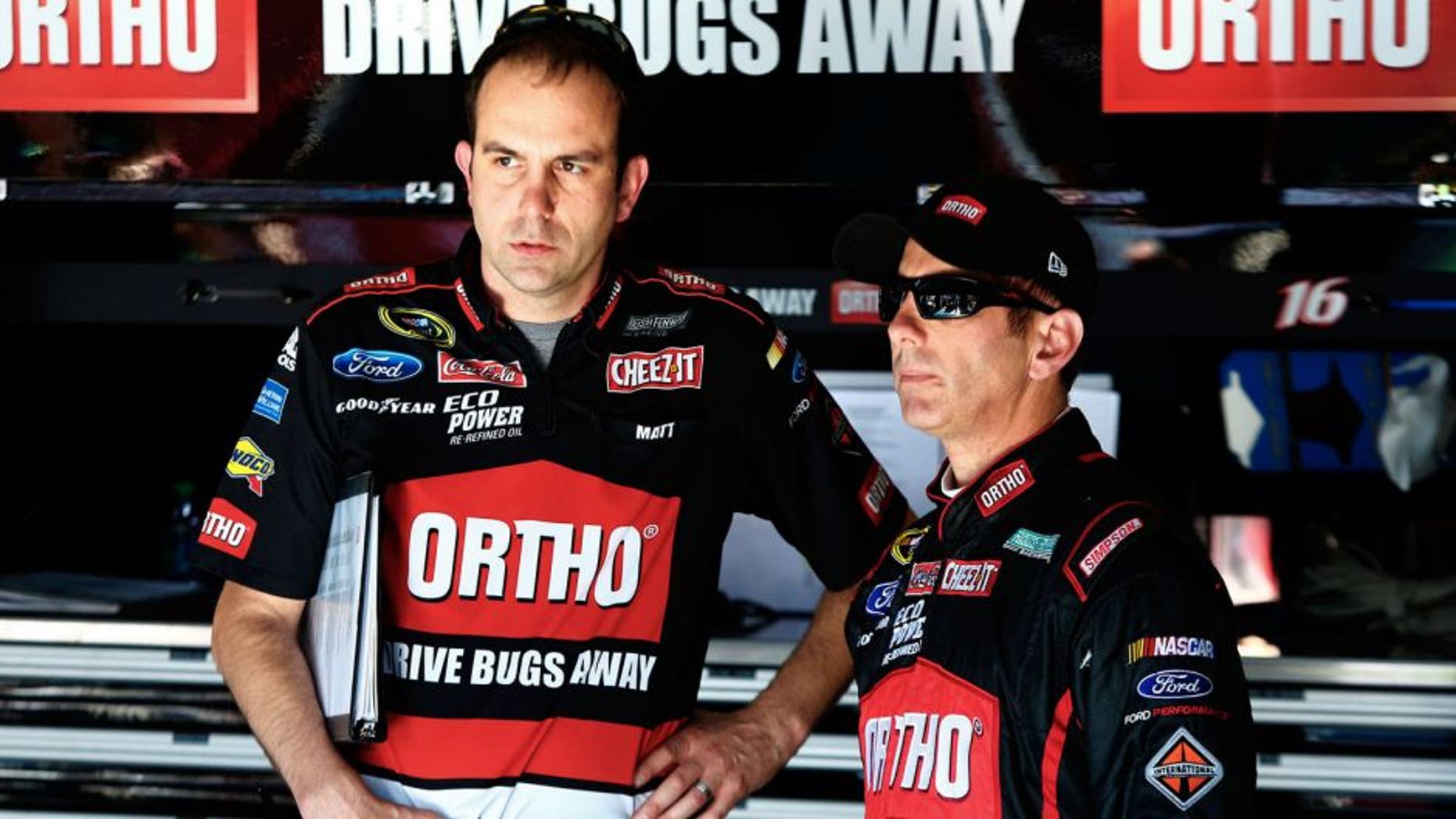 TALLADEGA, AL - MAY 01: Greg Biffle, driver of the #16 Ortho Ford, talks to his crew chief, Matt Puccia, in the garage area during practice for the NASCAR Sprint Cup Series GEICO 500 at Talladega Superspeedway on May 1, 2015 in Talladega, Alabama. (Photo by Jerry Markland/Getty Images)