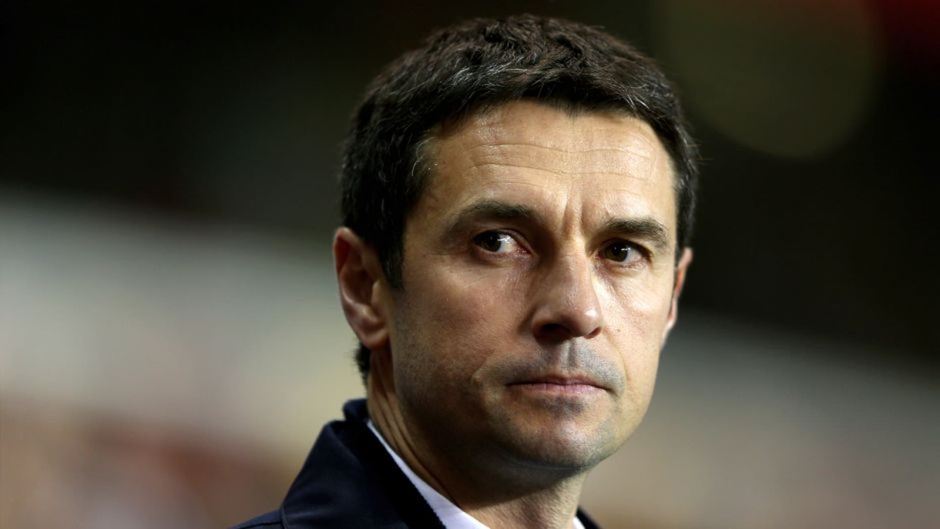LONDON, ENGLAND - FEBRUARY 14: Remi Garde the Head Coach of Olympique Lyonnais looks on during the UEFA Europa League round of 32 first leg match between Tottenham Hotspur and Olympique Lyonnais at White Hart Lane on February 14, 2013 in London, England. (Photo by Paul Gilham/Getty Images)