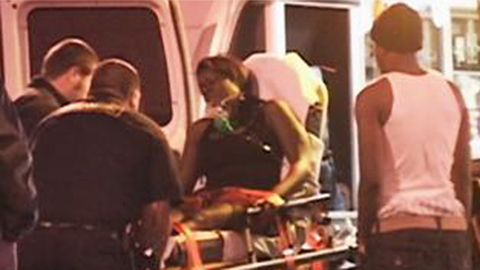Oct. 30: A victim of a shooting at an Oakland Halloween party gets loaded into an ambulance.