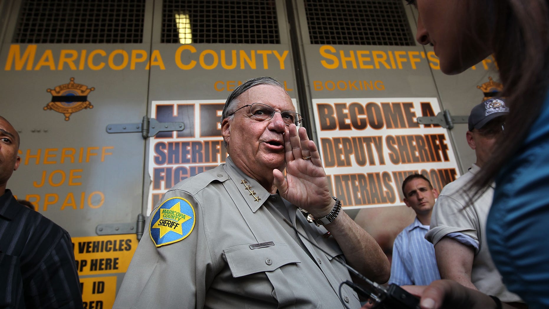 PHOENIX - JULY 29: Maricopa County Sheriff Joe Arpaio speaks to the media in front of his county jail on July 29, 2010 in Phoenix, Arizona, the day Arizona's immigration enforcement law SB 1070 went into effect. Although U.S. District Court Judge Susan Bolton suspended several controversial provisions of the law the previous day, Arpaio said he did not need the law in order to detain undocumented immigrants during his planned crime sweep in Phoenix. (Photo by John Moore/Getty Images)