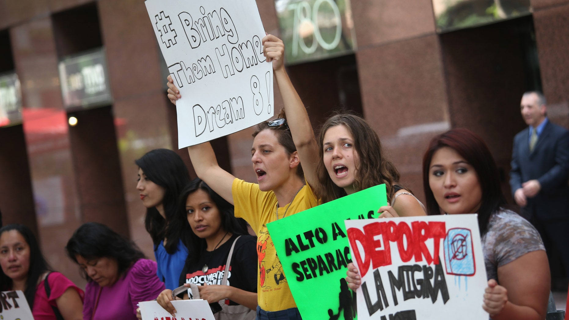 Demonstrators protest the deportation of undocumented immigrants on July 24, 2013 in New York City.