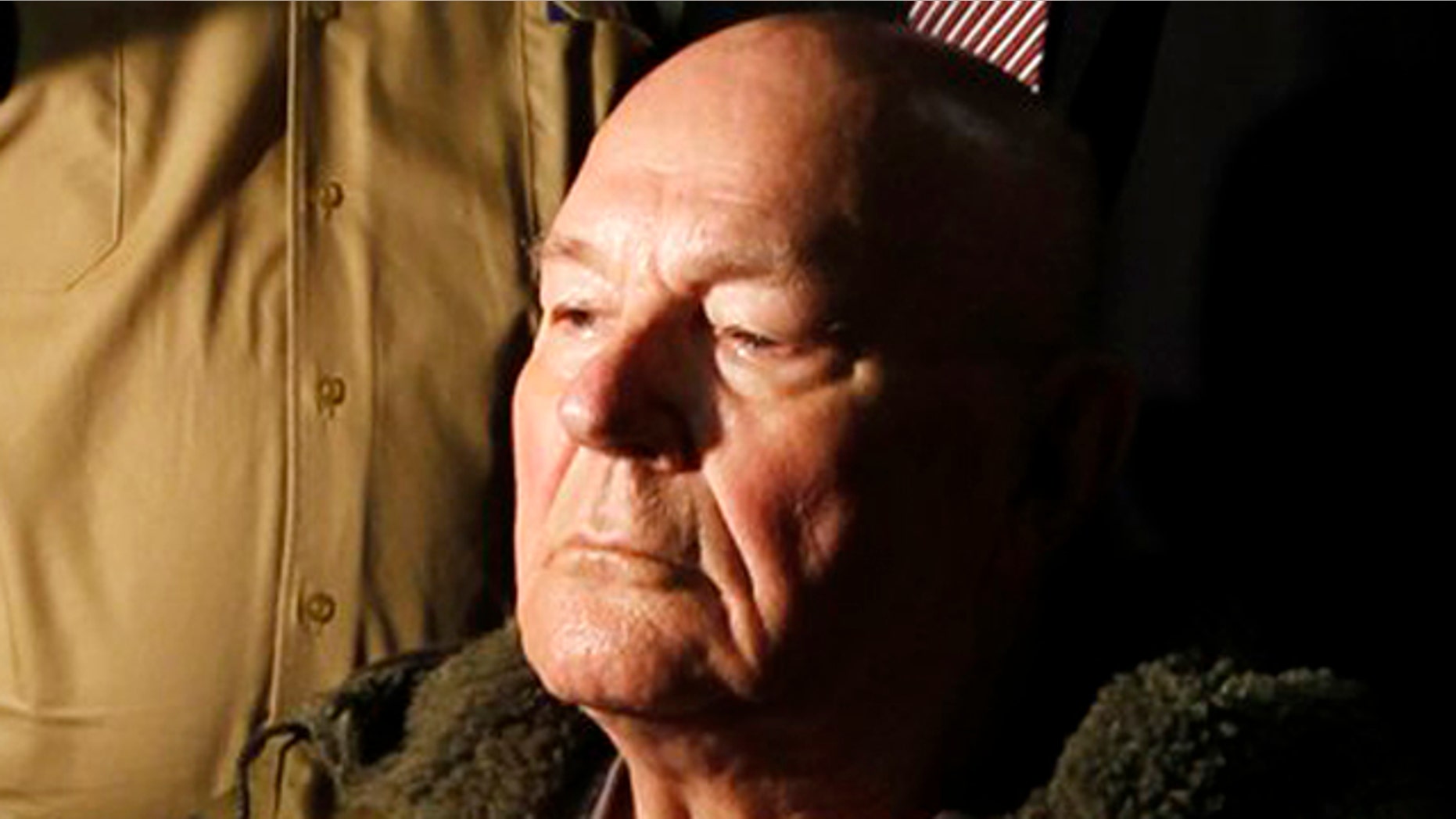 FILE- Retired U.S. auto worker John Demjanjuk waits in a courtroom in Munich. A new precedent set by the conviction of Demjanjuk allows prosecutors to reopen hundreds of similar cases.
