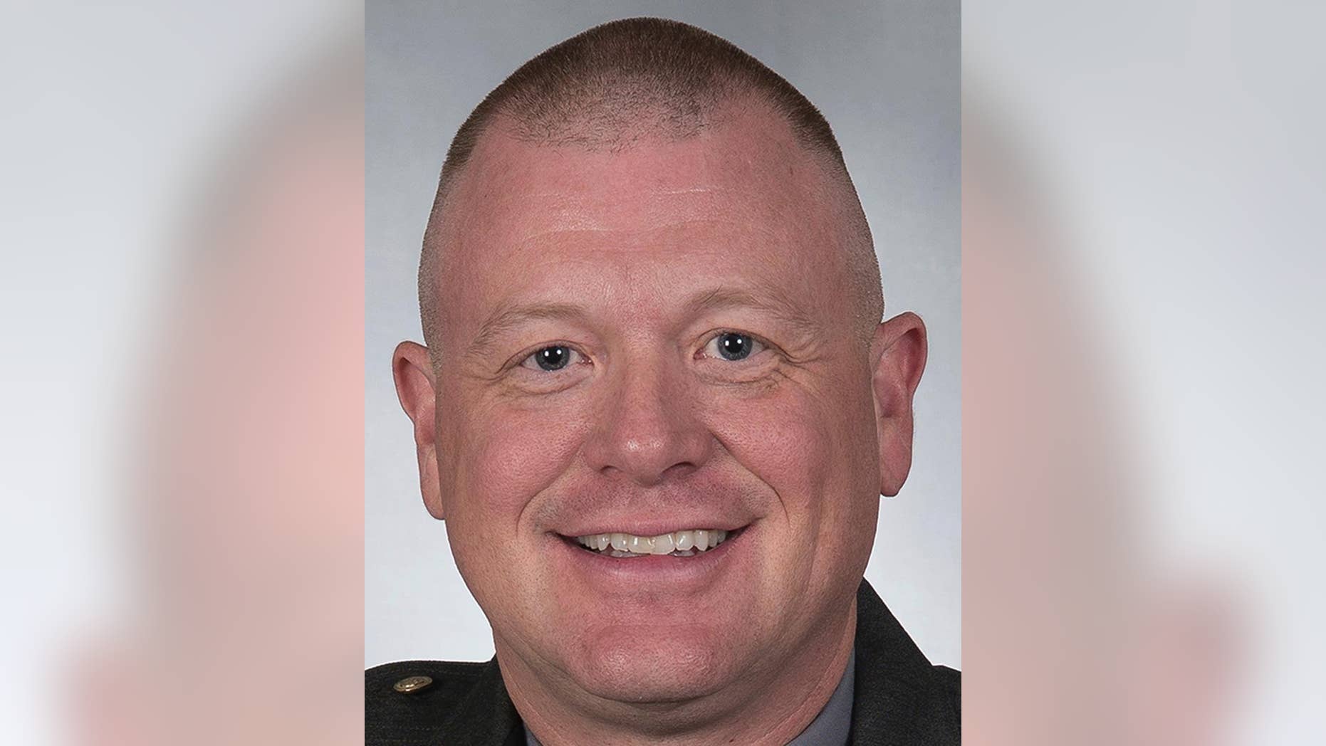 FILE – This undated file photo provided by the Ohio State Highway Patrol shows Lt. William Elschlager, commander of the Marietta Patrol Post in Marietta, Ohio. Elschlager, a former Ohio trooper fired after he was accused of stalking a subordinate's wife after an affair, was scheduled for arraignment Wednesday, Oct. 19, 2016, on new charges of finding or keeping personal information about other women obtained from a law enforcement database without authorization. (Ohio State Highway Patrol via AP, File)