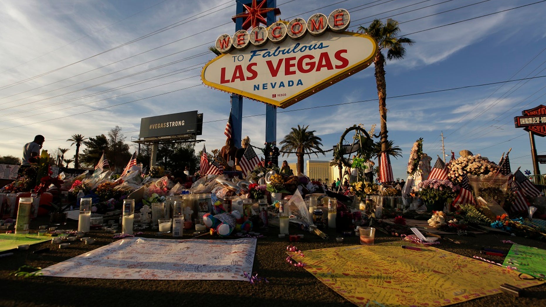 People visit a makeshift memorial for victims of the Oct. 1 mass shooting in Las Vegas, Oct. 16, 2017.