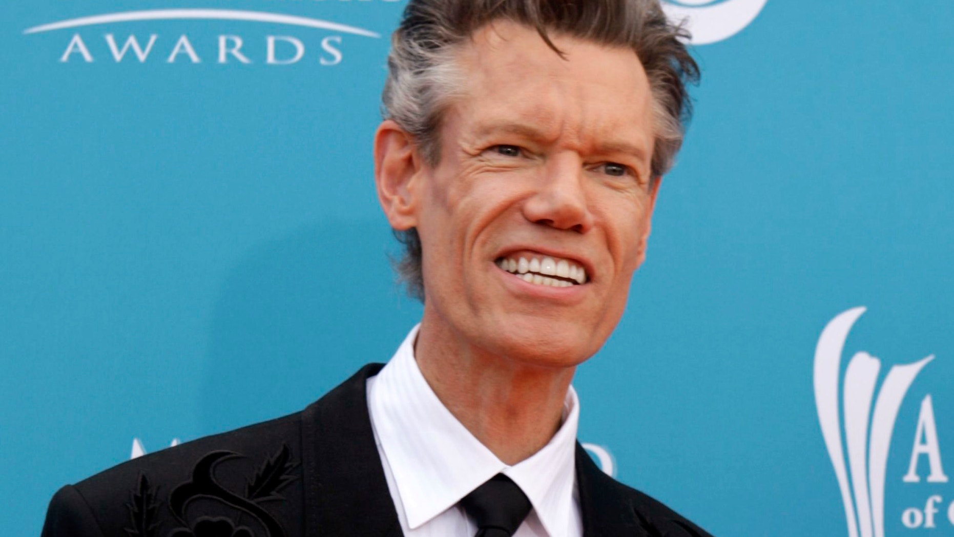 Singer Randy Travis arrives at the 45th annual Academy of Country Music Awards in Las Vegas.