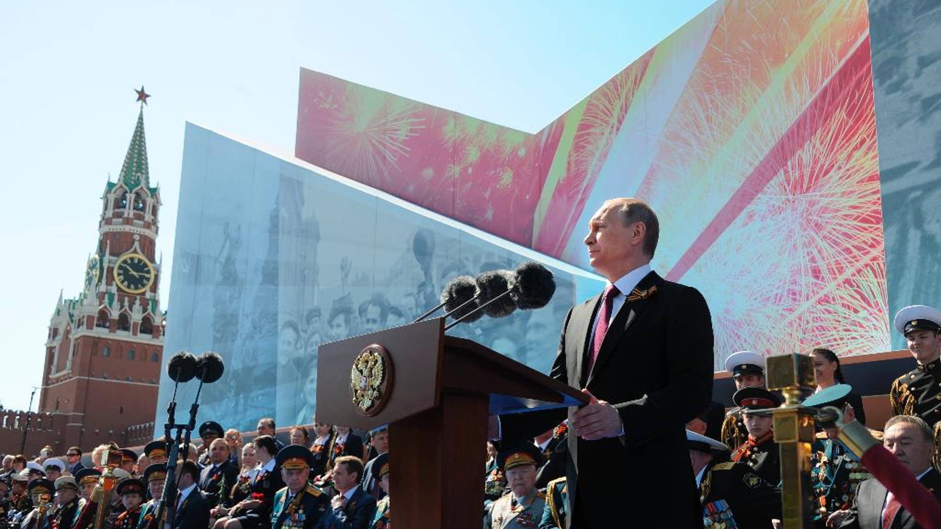 Russian President Vladimir Putin speaks during the Victory Day military parade marking 71 years after the victory in WWII, in Moscow's Red Square.