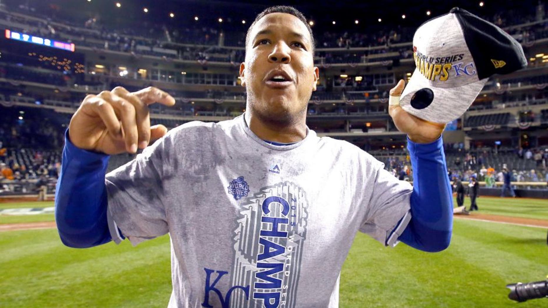 NEW YORK, NY - NOVEMBER 01: Salvador Perez #13 of the Kansas City Royals celebrates defeating the New York Mets in Game Five of the 2015 World Series at Citi Field on November 1, 2015 in the Flushing neighborhood of the Queens borough of New York City. The Kansas City Royals defeated the New York Mets with a score of 7 to 2 to win the World Series. (Photo by Al Bello/Getty Images)