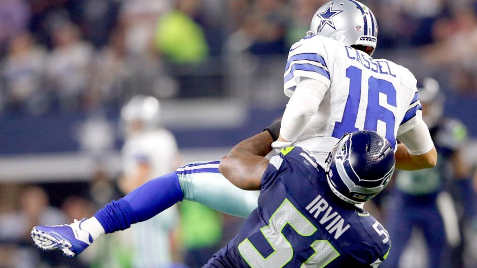 Nov 1, 2015; Arlington, TX, USA; Seattle Seahawks outside linebacker Bruce Irvin (51) sacks Dallas Cowboys quarterback Matt Cassel (16) during the fourth quarter at AT&T Stadium. Mandatory Credit: Kevin Jairaj-USA TODAY Sports