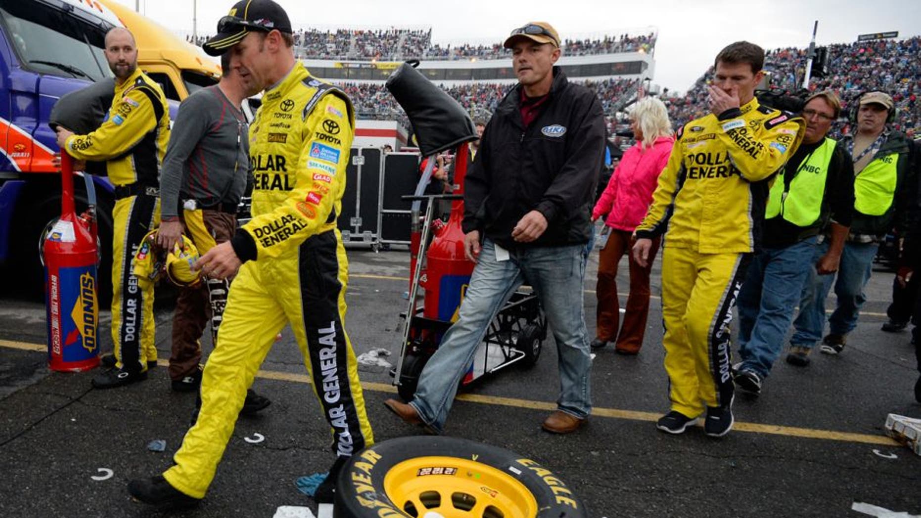 MARTINSVILLE, VA - NOVEMBER 01: Matt Kenseth, driver of the #20 Dollar General Toyota, walks through the garage area after an on-track incident with Joey Logano during the NASCAR Sprint Cup Series Goody's Headache Relief Shot 500 at Martinsville Speedway on November 1, 2015 in Martinsville, Virginia. (Photo by Robert Laberge/Getty Images)