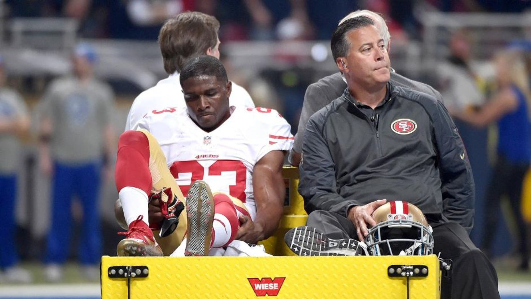 Nov 1, 2015; St. Louis, MO, USA; San Francisco 49ers running back Reggie Bush (23) is carted off the field after being injured during the first half against the St. Louis Rams at the Edward Jones Dome. Mandatory Credit: Denny Medley-USA TODAY Sports