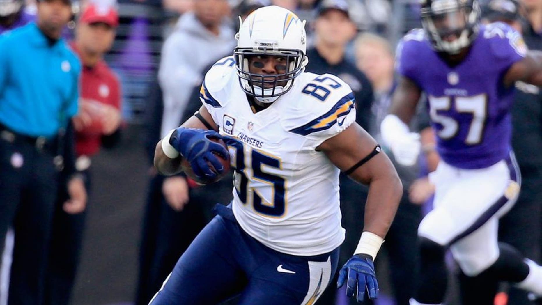 BALTIMORE, MD - NOVEMBER 30: Tight end Antonio Gates #85 of the San Diego Chargers picks up yards after a second quarter catch during a game against the Baltimore Ravens at M&T Bank Stadium on November 30, 2014 in Baltimore, Maryland. (Photo by Rob Carr/Getty Images)