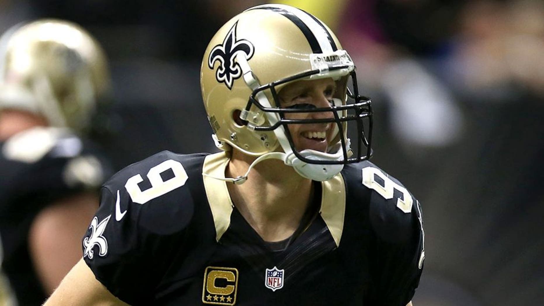 NEW ORLEANS, LA - NOVEMBER 01: Drew Brees #9 of the New Orleans Saints celebrates a touchdown during the second quarter of a game against the New York Giants at the Mercedes-Benz Superdome on November 1, 2015 in New Orleans, Louisiana. (Photo by Chris Graythen/Getty Images)