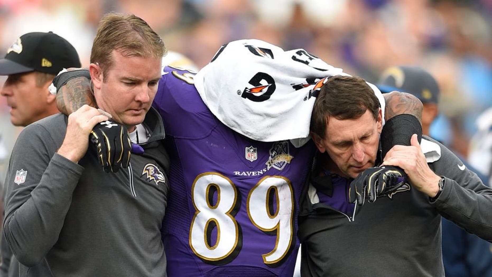 Baltimore Ravens wide receiver Steve Smith (89) is helped off the field after an injury during the second half of an NFL football game against the San Diego Chargers in Baltimore, Sunday, Nov. 1, 2015. (AP Photo/Nick Wass)