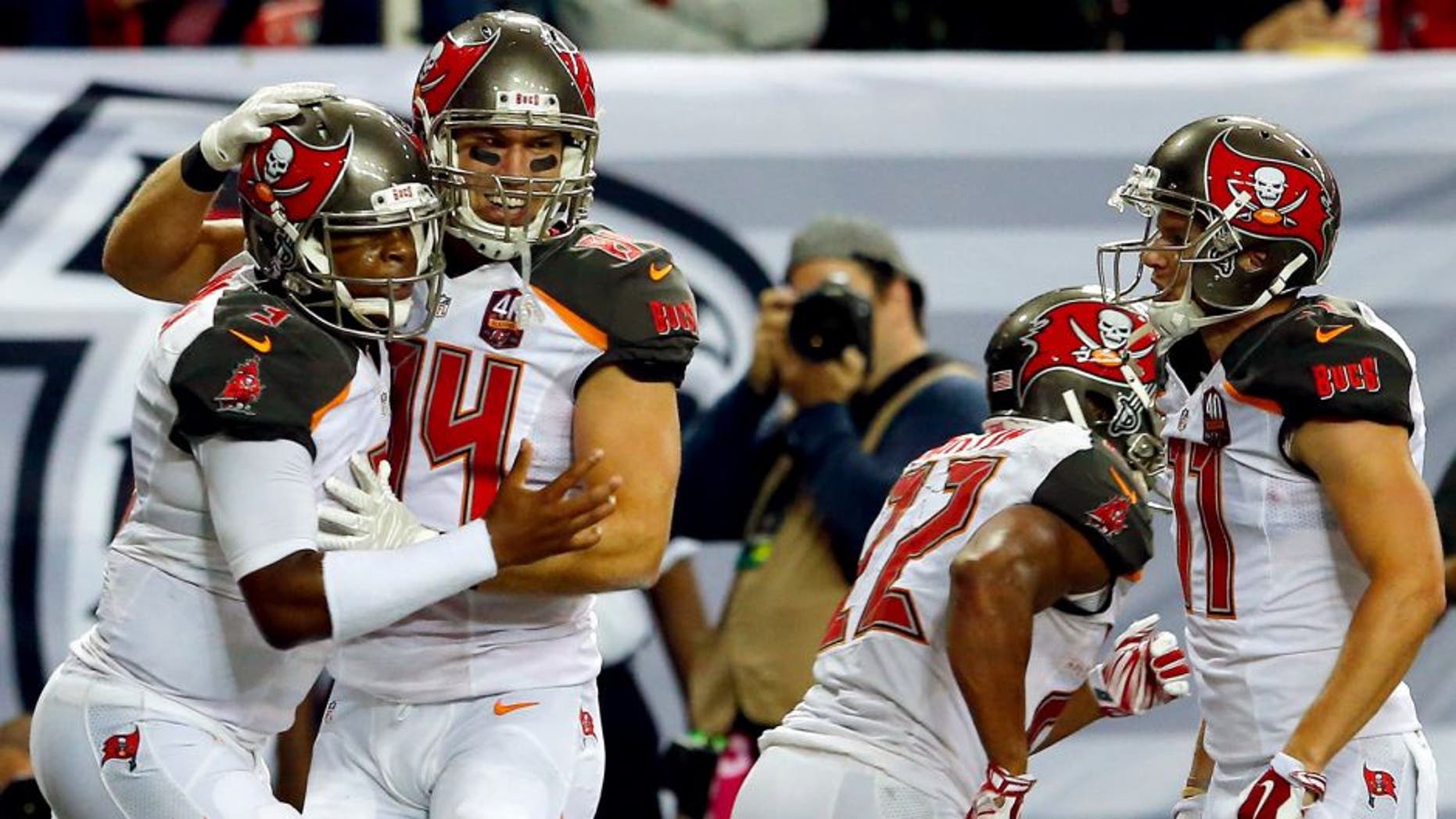 ATLANTA, GA - NOVEMBER 01: Jameis Winston #3 of the Tampa Bay Buccaneers celebrates a touchdown during the second half against the Atlanta Falcons at the Georgia Dome on November 1, 2015 in Atlanta, Georgia. (Photo by Kevin C. Cox/Getty Images)