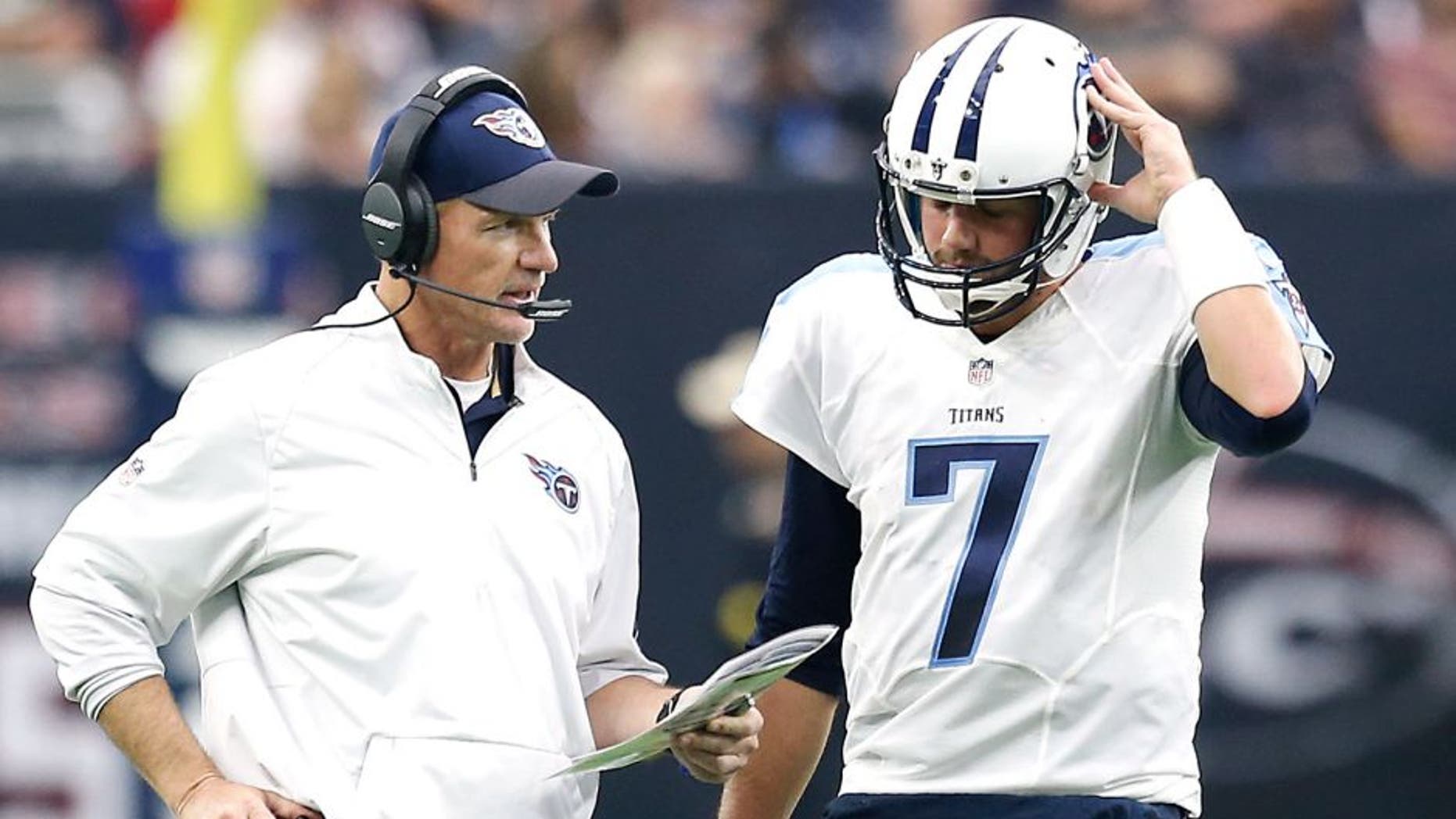 HOUSTON, TX - NOVEMBER 01: Head coach Ken Whisenhunt talks with Zach Mettenberger #7 of the Tennessee Titans during a timeout against the Houston Texans in the second quarter on November 1, 2015 at NRG Stadium in Houston, Texas. (Photo by Thomas B. Shea/Getty Images)