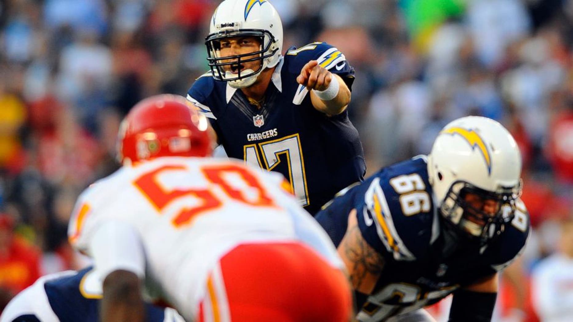 November 1, 2012; San Diego, CA, USA; San Diego Chargers quarterback Philip Rivers (17) calls plays at the line during the first quarter against the Kansas City Chiefs at Qualcomm Stadium. Mandatory Credit: Christopher Hanewinckel-USA TODAY Sports
