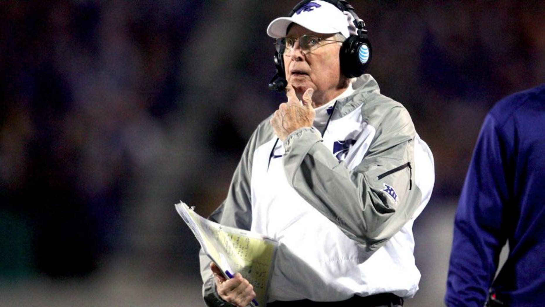 Nov 1, 2014; Manhattan, KS, USA; Kansas State Wildcats head coach Bill Snyder looks at the scoreboard during first-half action against the Oklahoma State Cowboys at Bill Snyder Family Stadium. Mandatory Credit: Scott Sewell-USA TODAY Sports