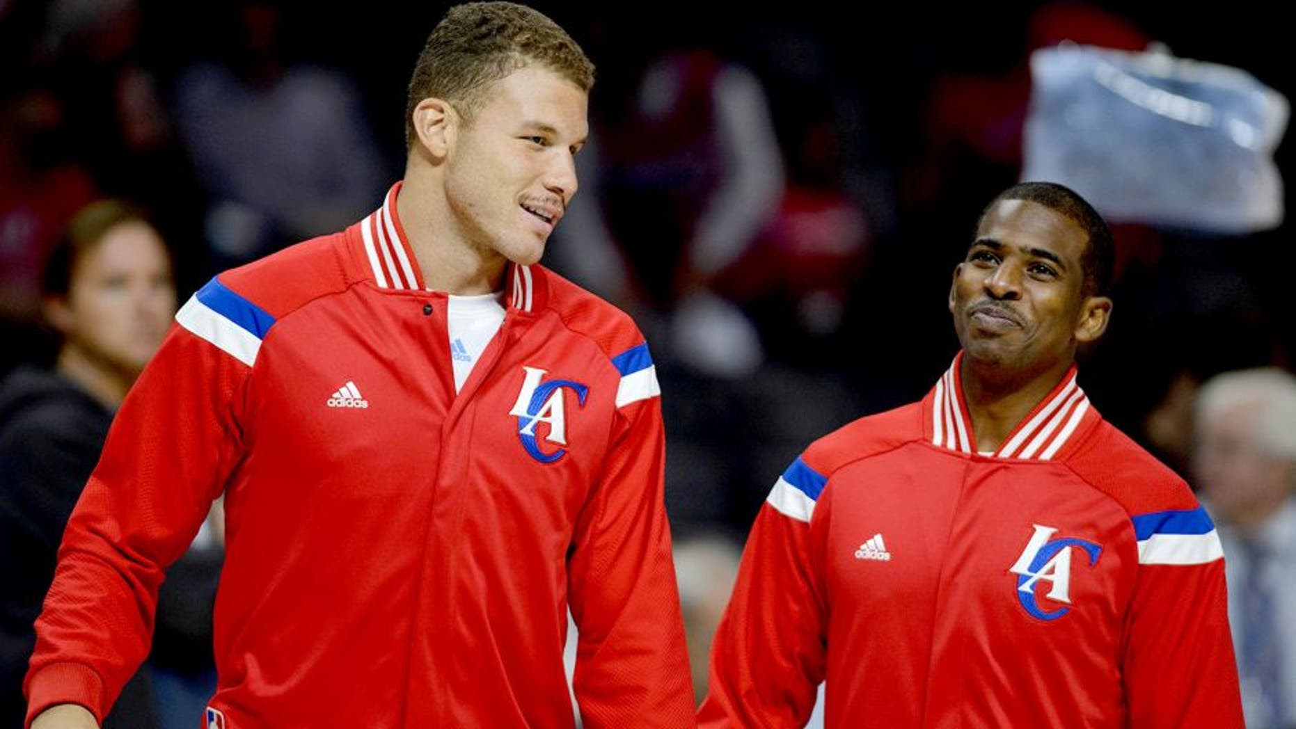Nov 2, 2014; Los Angeles, CA, USA; Los Angeles Clippers forward Blake Griffin (left) talks with Los Angeles Clippers guard Chris Paul (right) prior to the game against the Sacramento Kings at Staples Center. Mandatory Credit: Kelvin Kuo-USA TODAY Sports