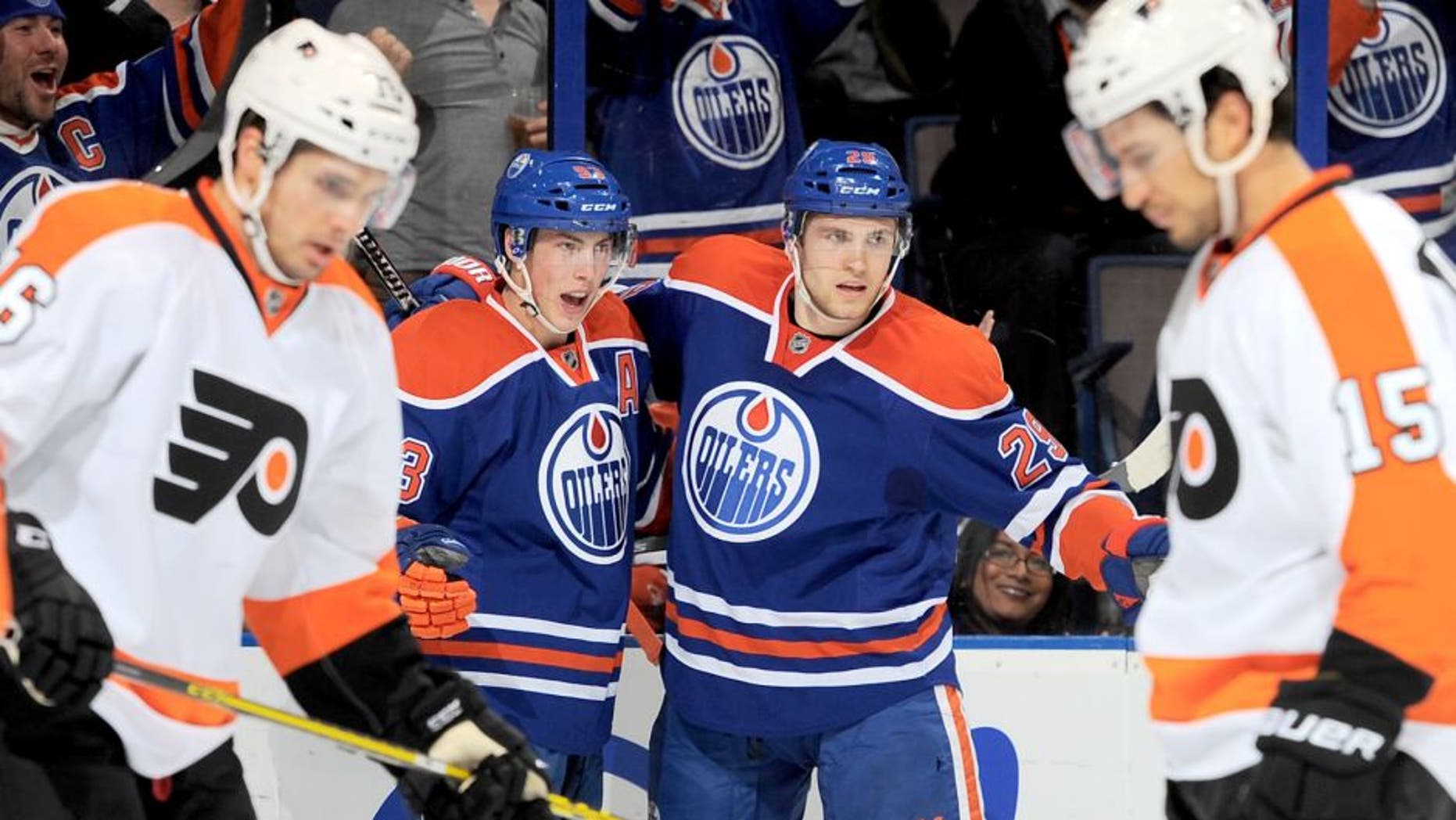 EDMONTON, AB - NOVEMBER 3: Ryan Nugent-Hopkins #93 and Leon Draisaitl #29 of the Edmonton Oilers celebrate after a goal during a game against the Philadelphia Flyers on November 3, 2015 at Rexall Place in Edmonton, Alberta, Canada. (Photo by Andy Devlin/NHLI via Getty Images)