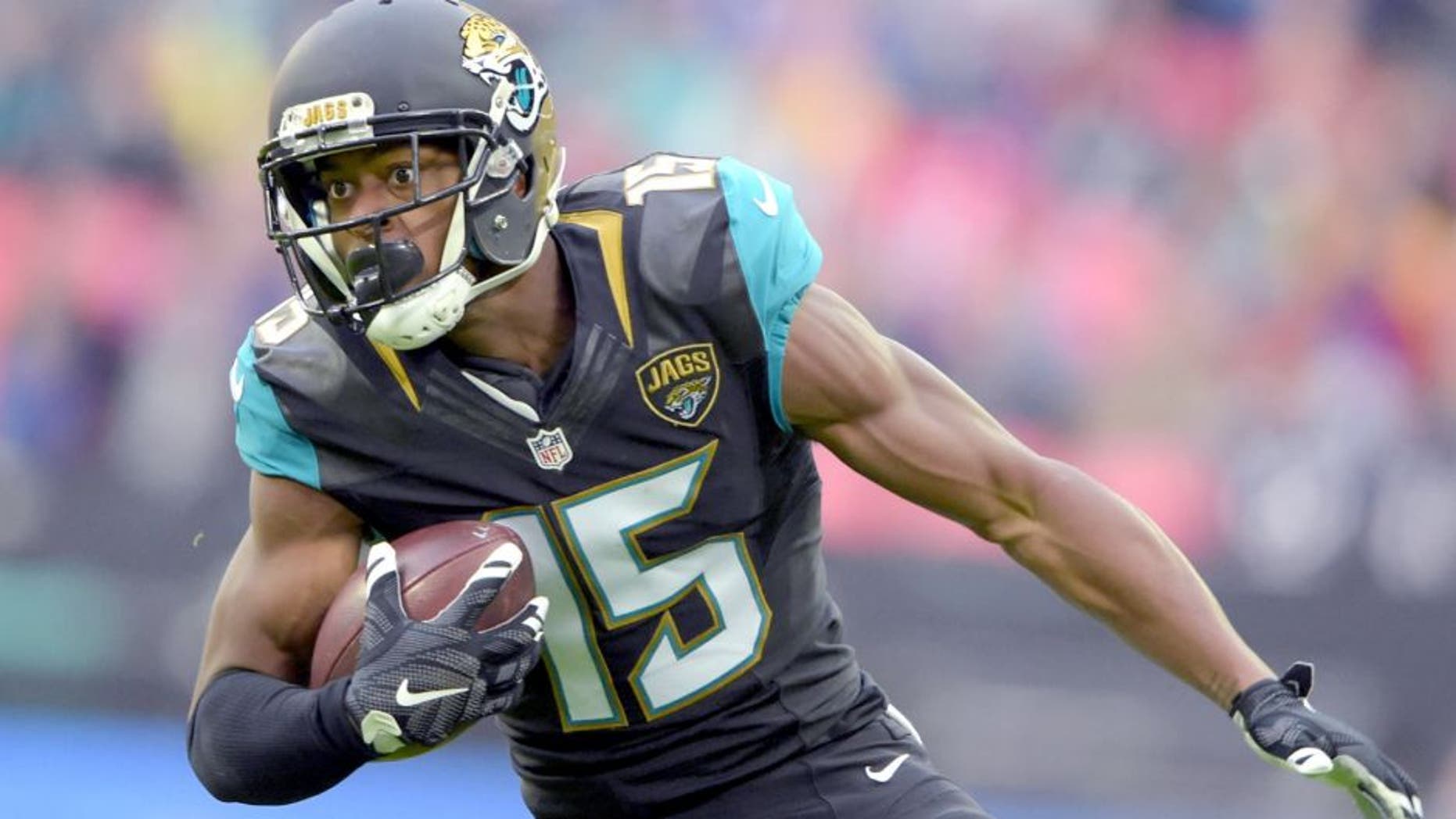 Oct 25, 2015; London, United Kingdom; Jacksonville Jaguars receiver Allen Robinson (15) carries the ball against the Buffalo Bills during NFL International Series game at Wembley Stadium. Mandatory Credit: Kirby Lee-USA TODAY Sports