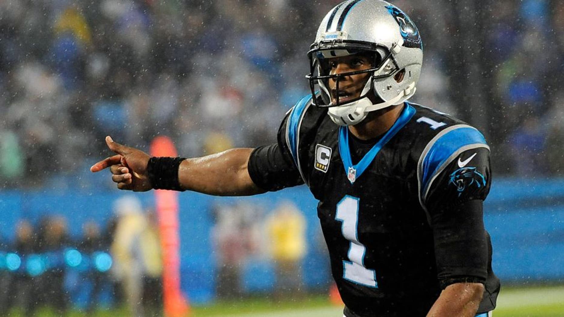Nov 2, 2015; Charlotte, NC, USA; Carolina Panthers quarterback Cam Newton (1) prepares to take the snap during the second half of the game against the Indianapolis Colts at Bank of America Stadium. Mandatory Credit: Sam Sharpe-USA TODAY Sports
