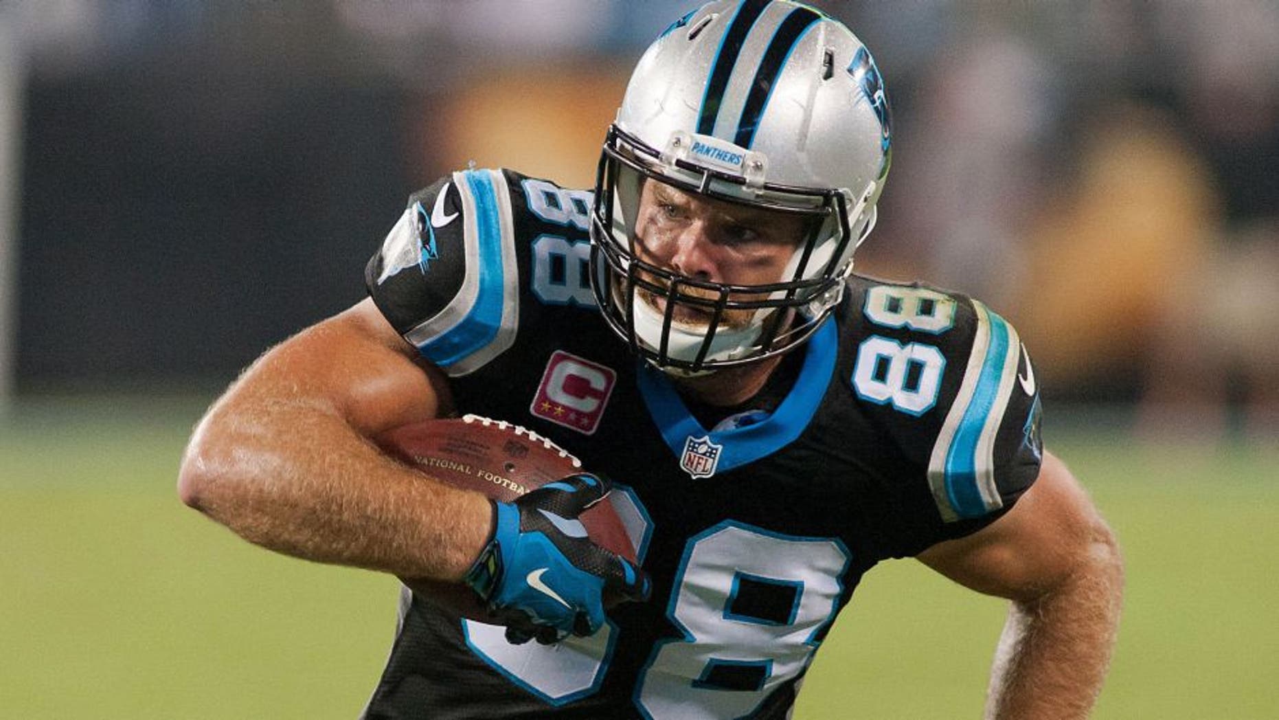 Oct 25, 2015; Charlotte, NC, USA; Carolina Panthers tight end Greg Olsen (88) runs after making a catch during the third quarter against the Philadelphia Eagles at Bank of America Stadium. Carolina defeated Philadelphia 27-16. Mandatory Credit: Jeremy Brevard-USA TODAY Sports