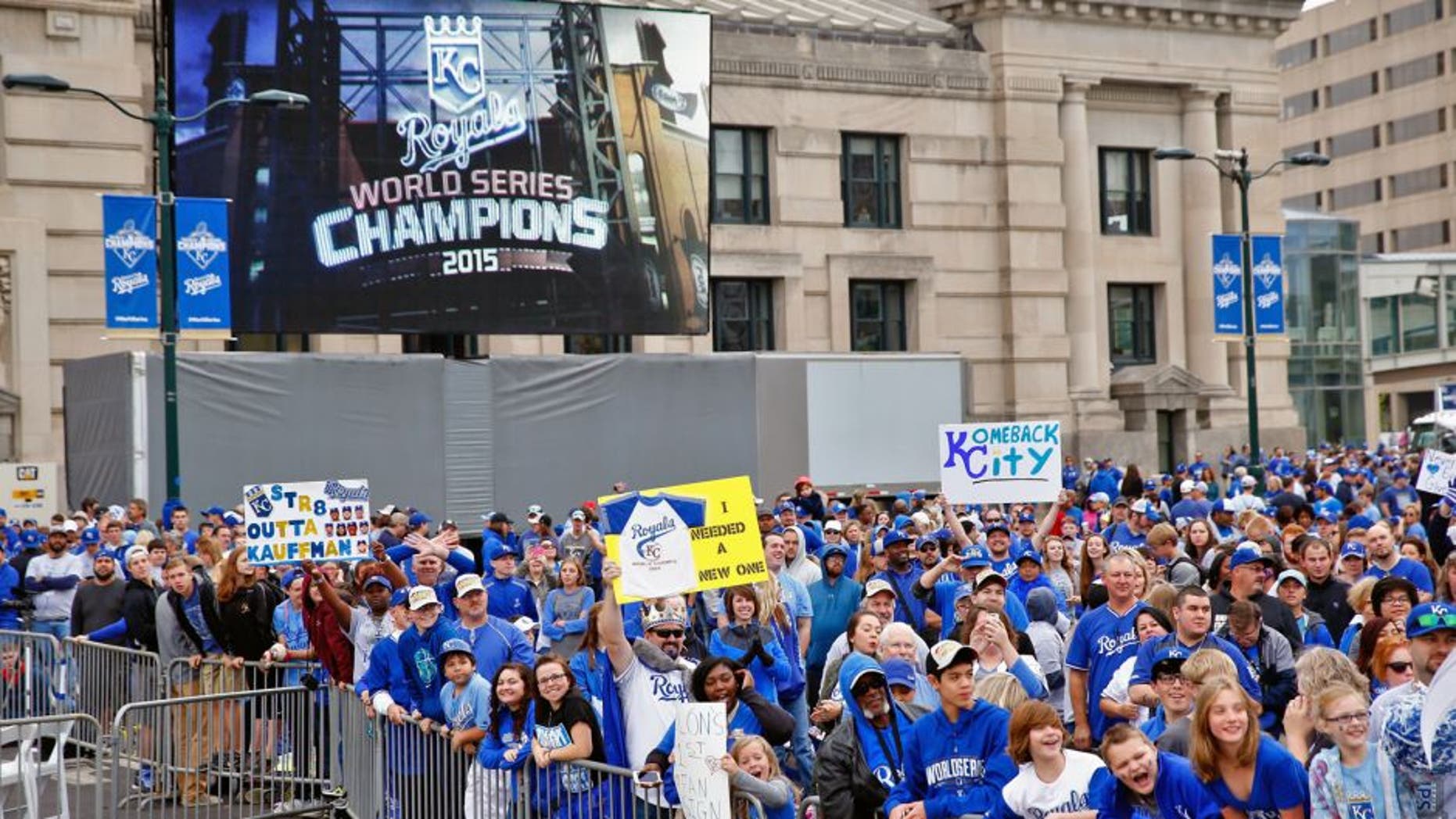 KANSAS CITY, MO - NOVEMBER 03: Fans cheer during a parade and celebration in honor of the Kansas City Royals' World Series win on November 3, 2015 in Kansas City, Missouri. (Photo by Jamie Squire/Getty Images)