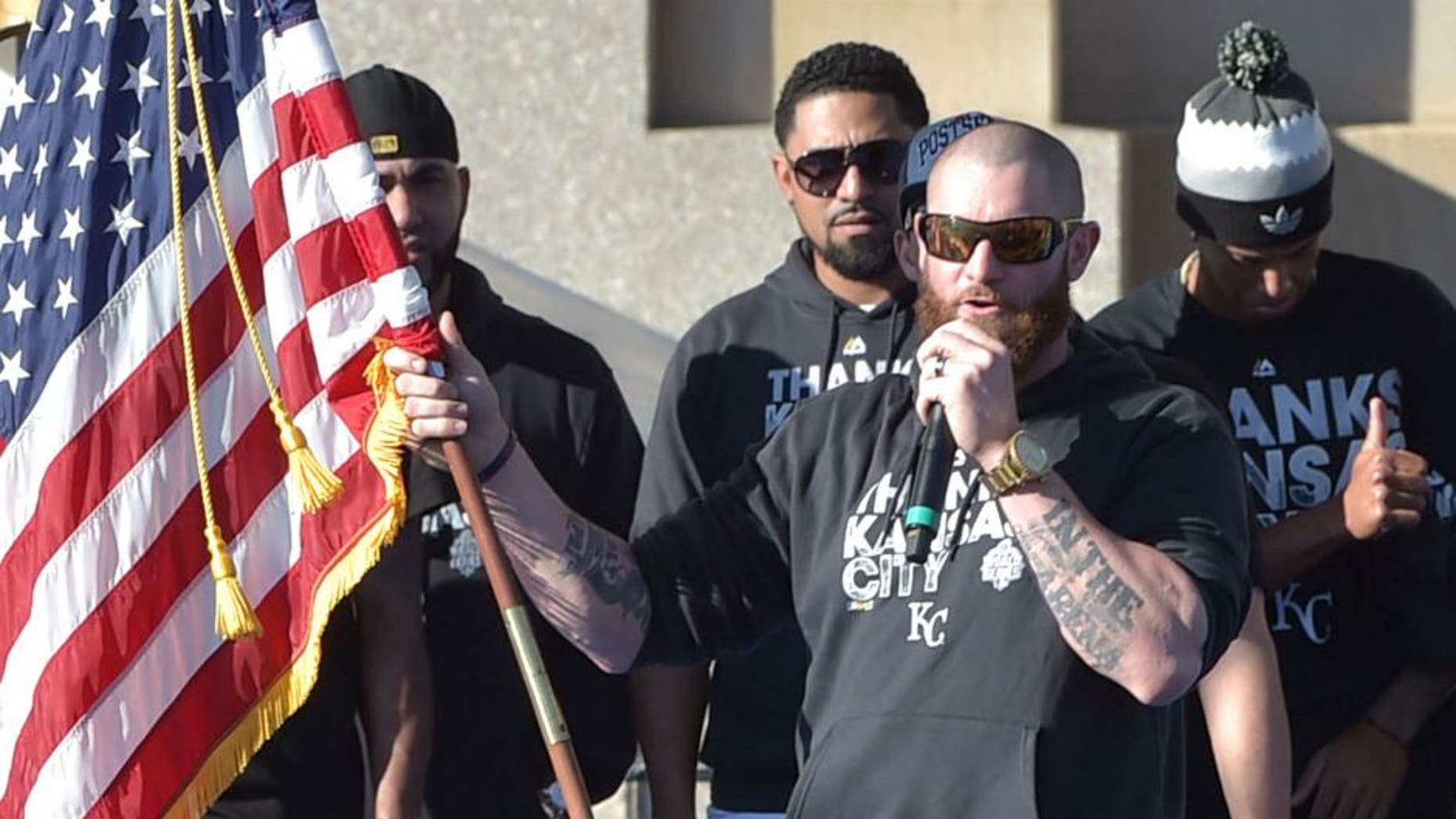 Nov 3, 2015; Kansas City, MO, USA; Kansas City Royals player Jonny Gomes speaks to fans during the World Series victory celebration on stage at Union Station. Mandatory Credit: Denny Medley-USA TODAY Sports