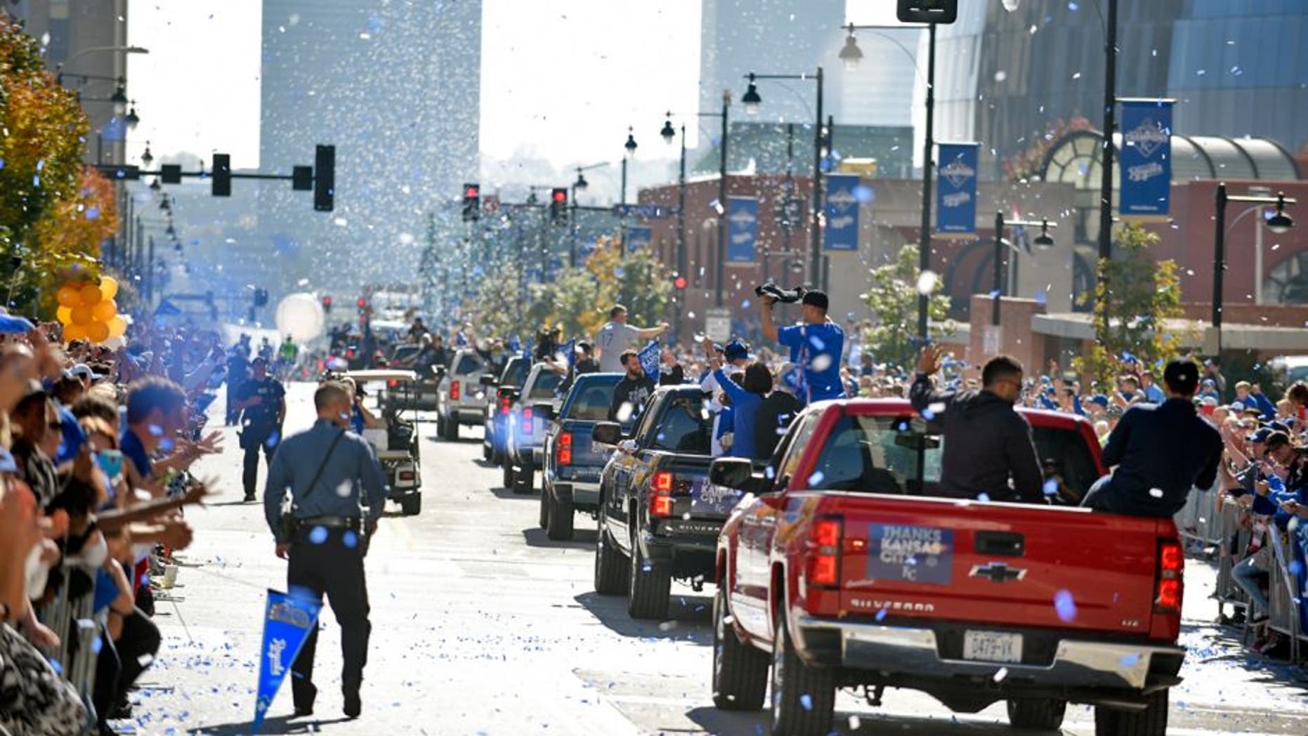 KANSAS CITY, MO -NOVEMBER 3: Members of the Kansas City Royals make their way through the steers of downtown during a parade to celebrate their World Series victory on November 3, 2015 in Kansas City, Missouri. (Photo by Ed Zurga/Getty Images)