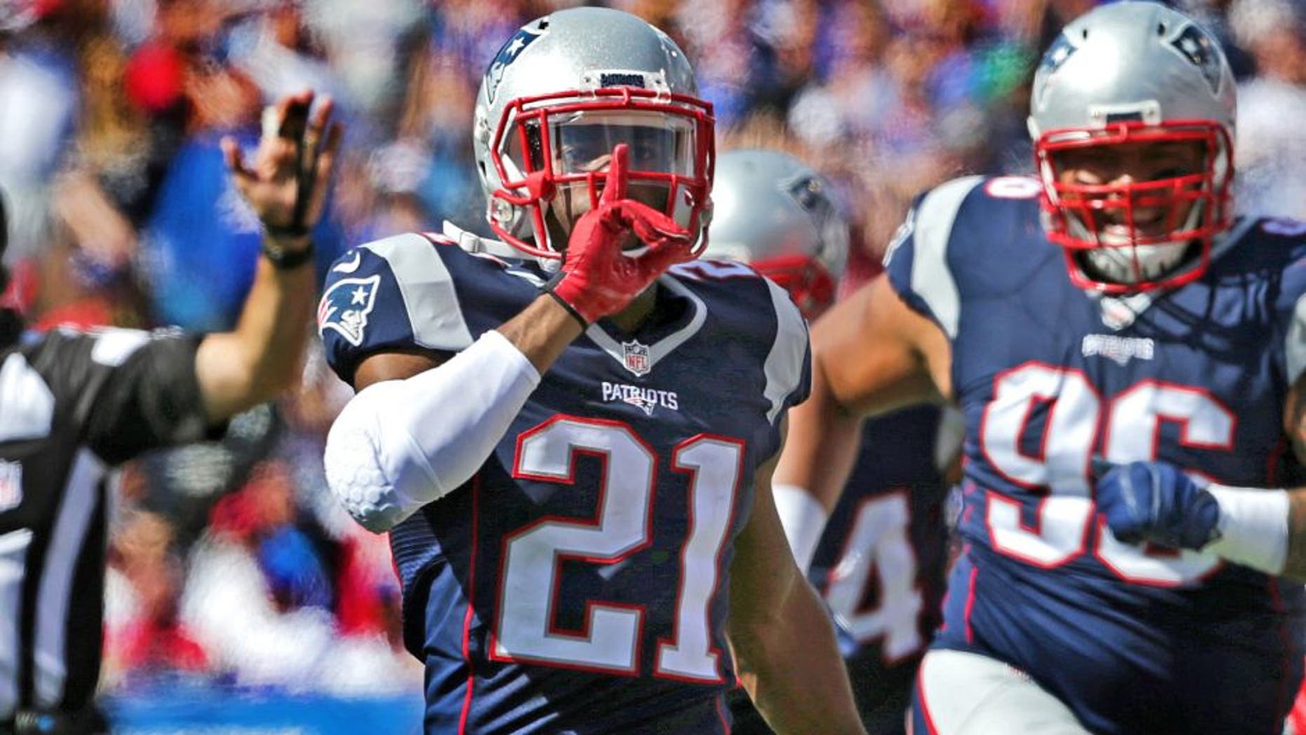 ORCHARD PARK, NY - SEPTEMBER 20: New England Patriots cornerback Malcolm Butler (#21) calls for silence after his interception on a deflection in the second quarter. The New England Patriots take on the Buffalo Bills at Ralph Wilson Stadium in Orchard Park, New York, Sept. 20, 2015. (Photo by Barry Chin/The Boston Globe via Getty Images)