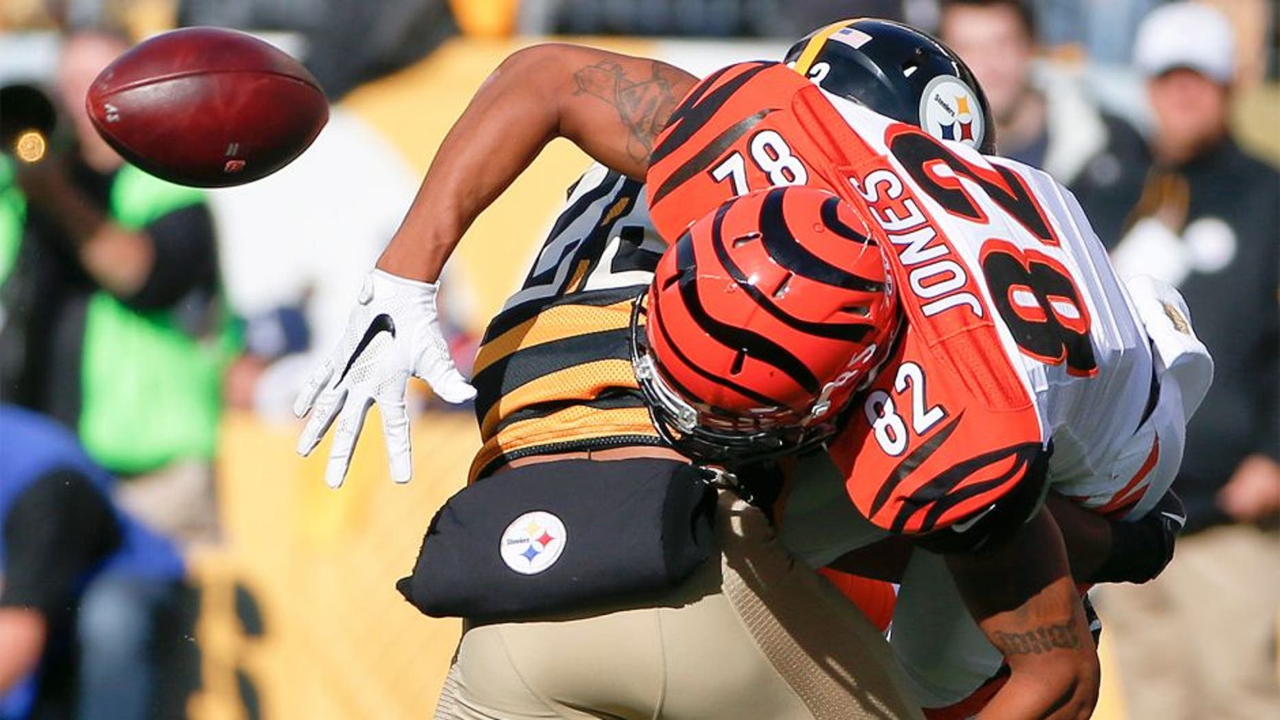 Pittsburgh Steelers free safety Mike Mitchell (23) breaks up a pass to Cincinnati Bengals wide receiver Marvin Jones (82) in the second quarter an NFL football game, Sunday, Nov. 1, 2015, in Pittsburgh. (AP Photo/Gene J. Puskar)