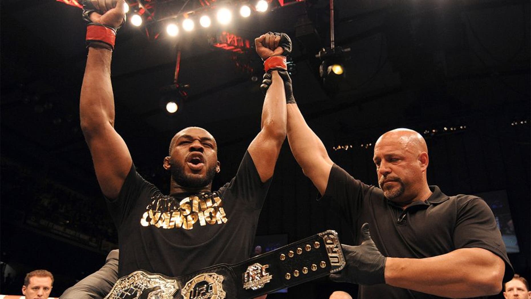 BALTIMORE, MD - APRIL 26: Jon "Bones" Jones reacts after defeating Glover Teixeira in their light heavyweight championship bout during the UFC 172 event at the Baltimore Arena on April 26, 2014 in Baltimore, Maryland. (Photo by Patrick Smith/Zuffa LLC/Zuffa LLC via Getty Images)