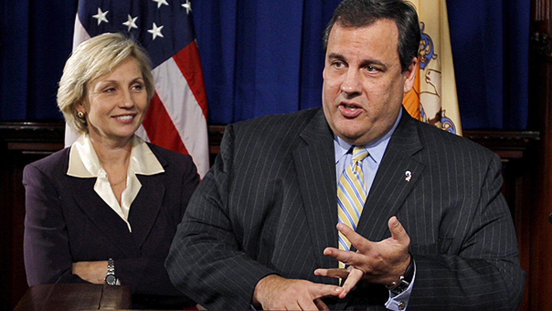 Nov. 3: New Jersey Lt. Gov. Kim Guadagno looks on in Trenton, N.J. as Gov. Chris Christie emphatically counts out the ways that he has said he won't run for president.