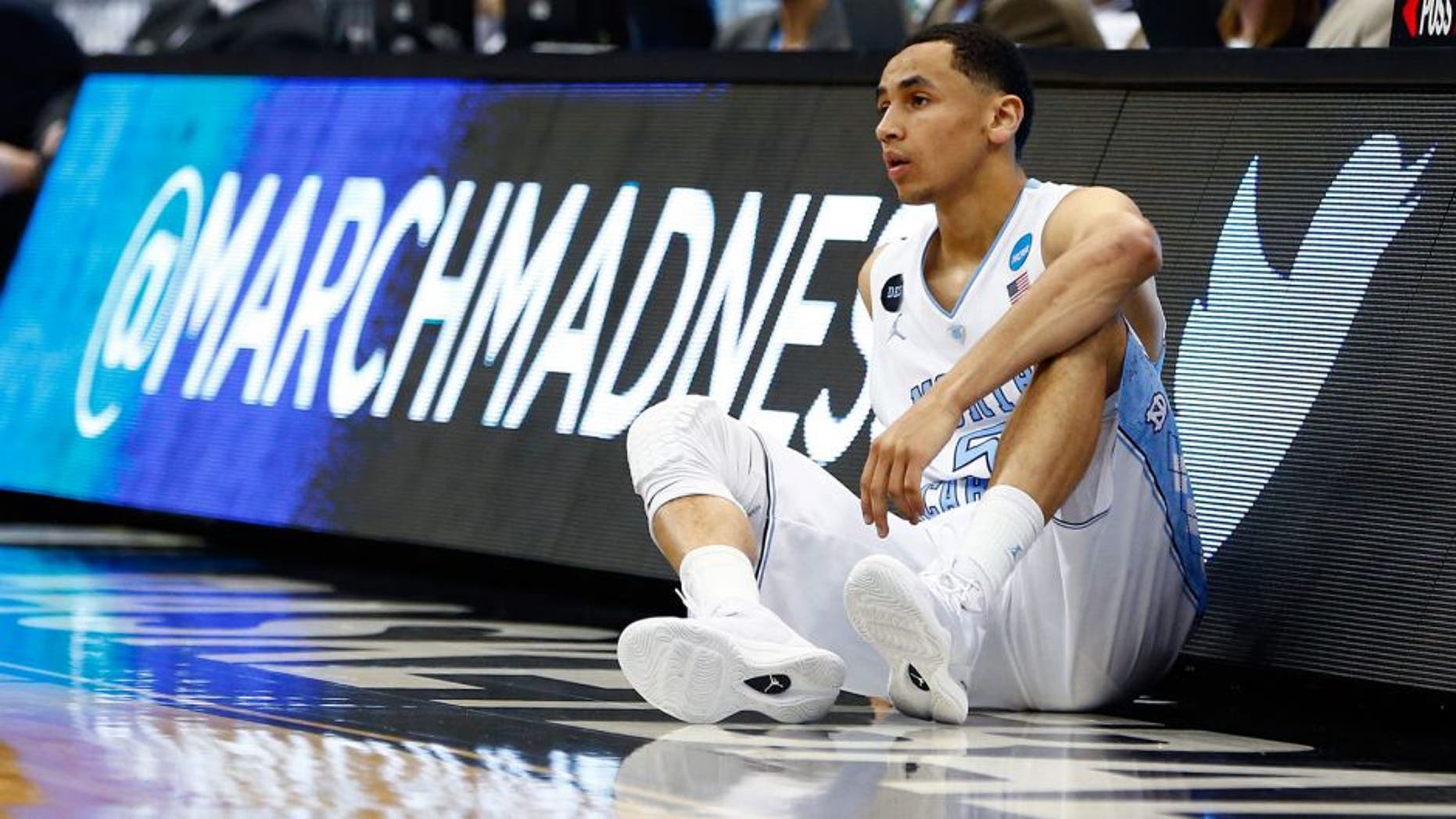 JACKSONVILLE, FL - MARCH 21: Marcus Paige #5 of the North Carolina Tar Heels looks on against the Arkansas Razorbacks in the first half during the third round of the 2015 NCAA Men's Basketball Tournament at Jacksonville Veterans Memorial Arena on March 21, 2015 in Jacksonville, Florida. (Photo by Kevin C. Cox/Getty Images)