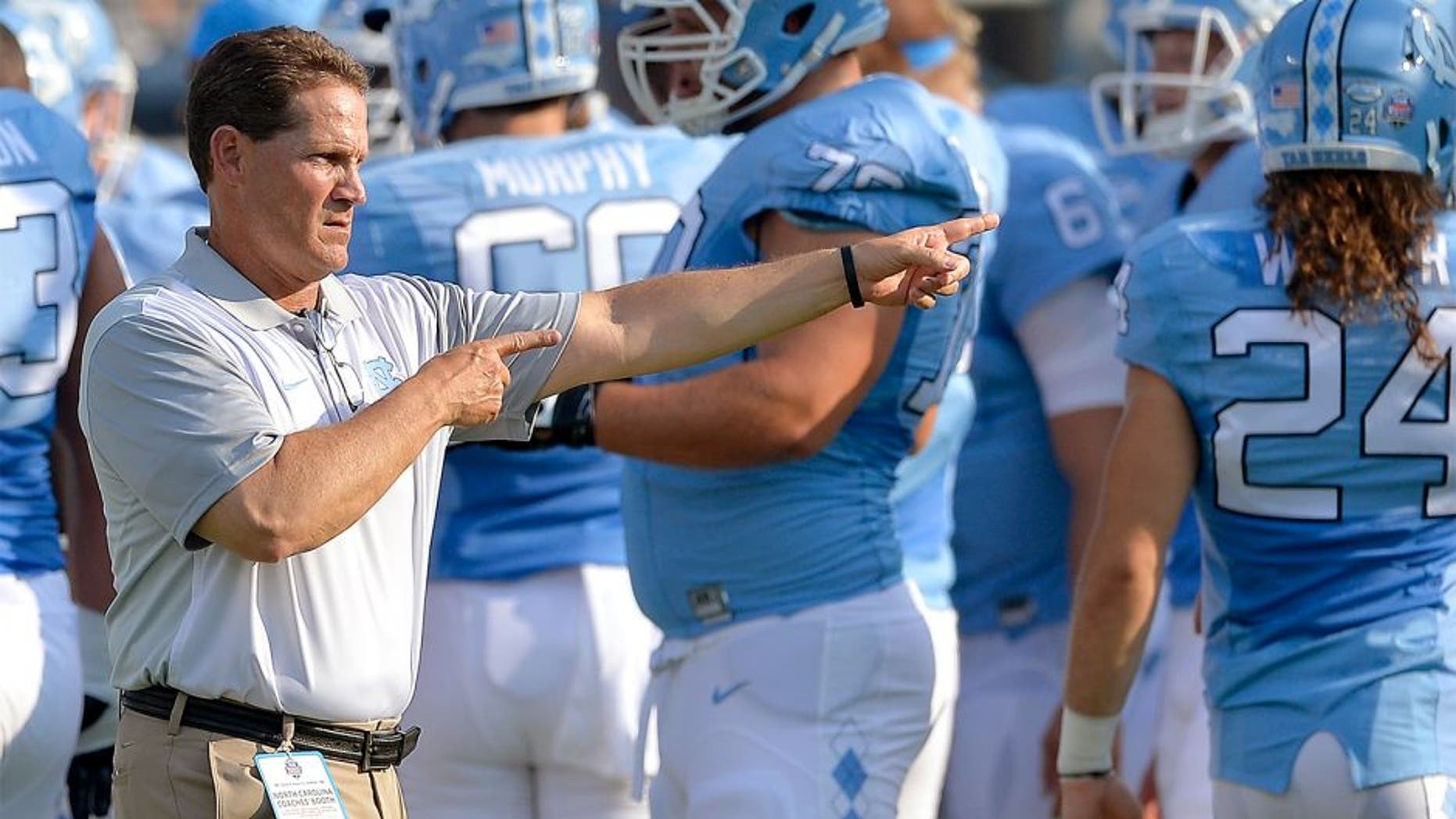 CHARLOTTE, NC - SEPTEMBER 03: Defensive coordinator Gene Chizik of the North Carolina Tar Heels during their game against the South Carolina Gamecocks at Bank of America Stadium on September 3, 2015 in Charlotte, North Carolina. South Carolina won 17-13. (Photo by Grant Halverson/Getty Images)