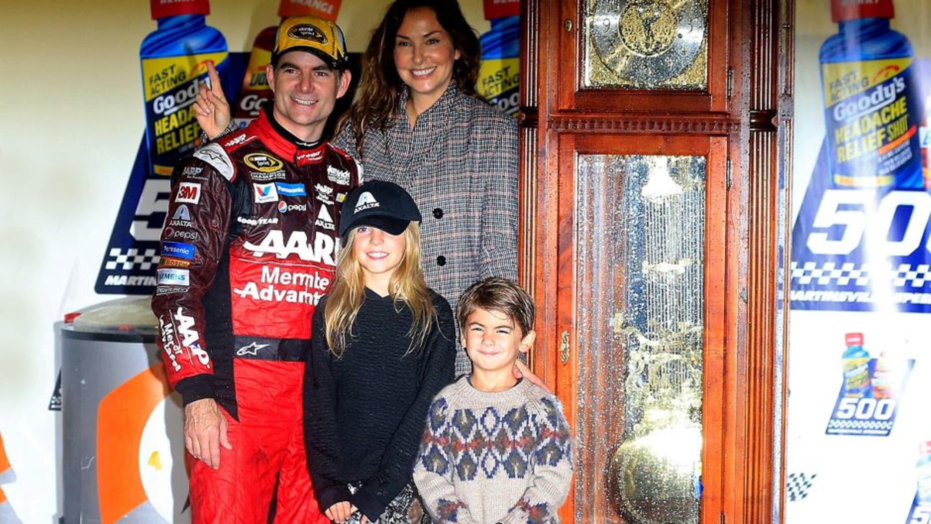 MARTINSVILLE, VA - NOVEMBER 01: Jeff Gordon, driver of the #24 AARP Member Advantages Chevrolet, his wife Ingrid Vandebosch, and their children Ella and Leo pose for a photo in Victory Lane after winning the NASCAR Sprint Cup Series Goody's Headache Relief Shot 500 at Martinsville Speedway on November 1, 2015 in Martinsville, Virginia. (Photo by Chris Trotman/NASCAR via Getty Images)