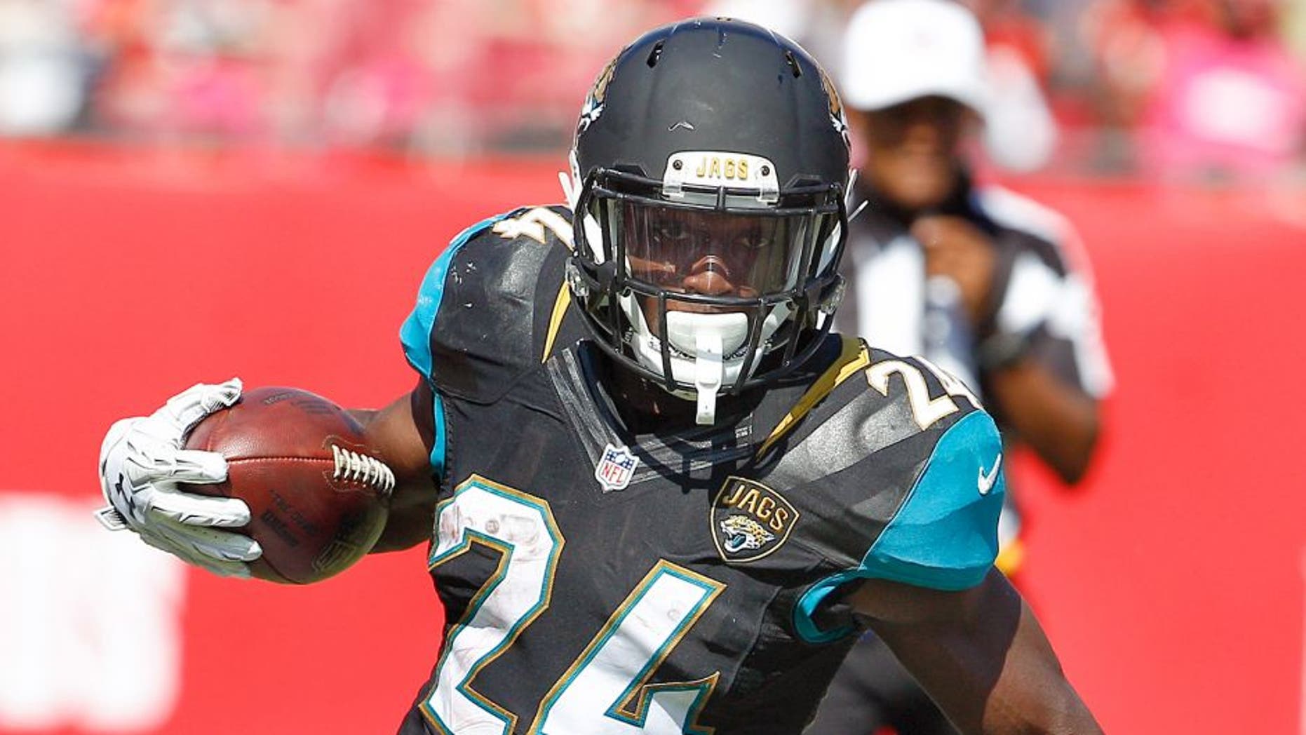 Oct 11, 2015; Tampa, FL, USA; Jacksonville Jaguars running back T.J. Yeldon (24) runs the ball during the second half of an NFL football game against the Tampa Bay Buccaneers at Raymond James Stadium. Tampa won 38-31. Mandatory Credit: Reinhold Matay-USA TODAY Sports