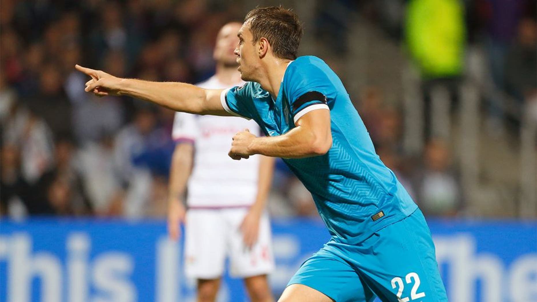 LYON, FRANCE - NOVEMBER 4: Artem Dzyuba of FC Zenit celebrates scoring the first goal during the UEFA Champions league match between Olympique Lyonnais (OL) and FC Zenit St Petersburg at Stade de Gerland on November 4, 2015 in Lyon, France. (Photo by Jean Catuffe/Getty Images)