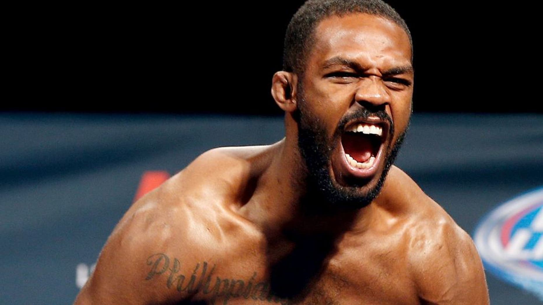 LAS VEGAS, NV - JANUARY 02: UFC light heavyweight champion Jon "Bones" Jones poses on the scale after weighing in during the UFC 182 weigh-in event at the MGM Grand Conference Center on January 2, 2015 in Las Vegas, Nevada. (Photo by Josh Hedges/Zuffa LLC/Zuffa LLC via Getty Images)